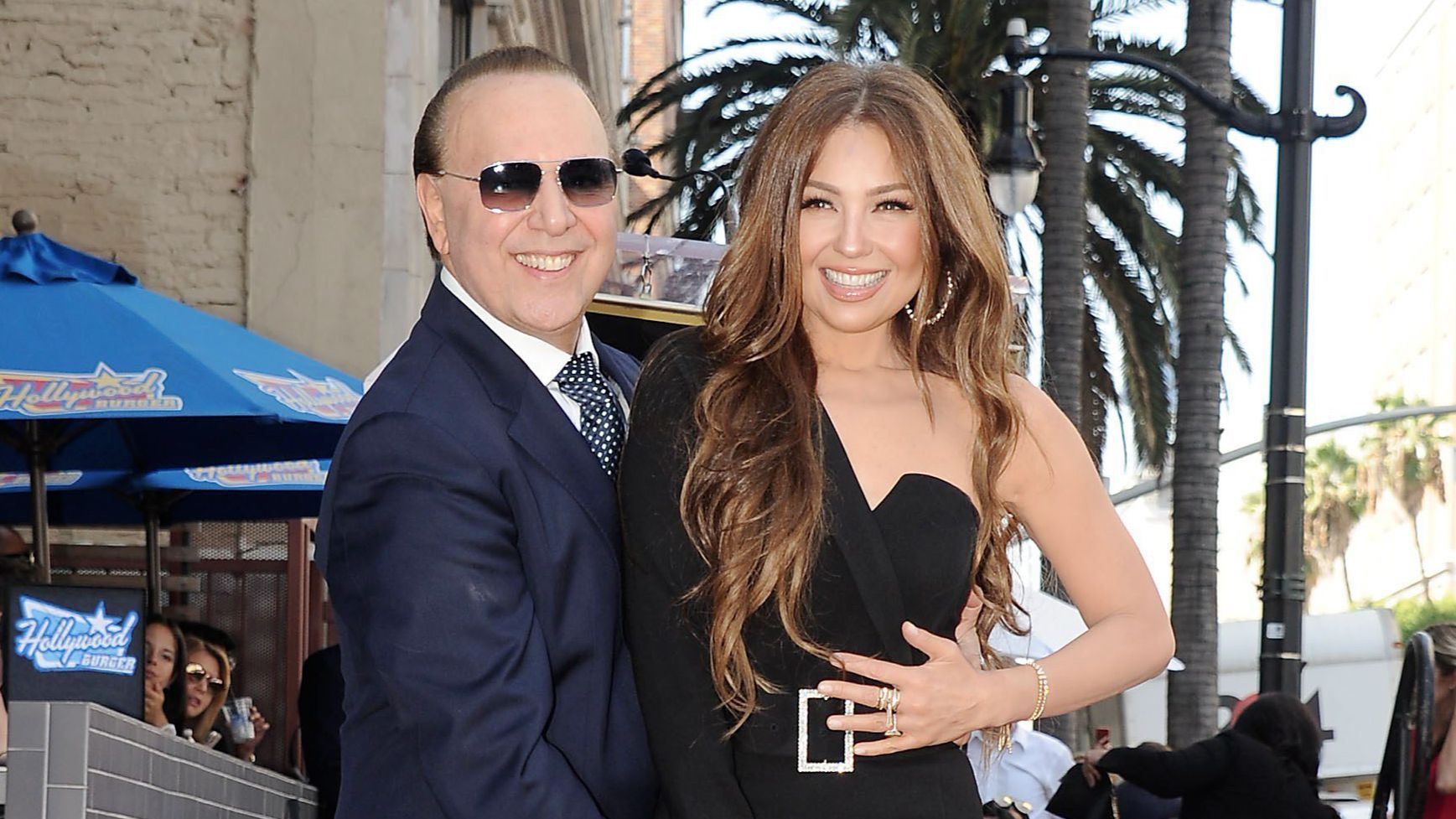 Thalía junto a su marido.