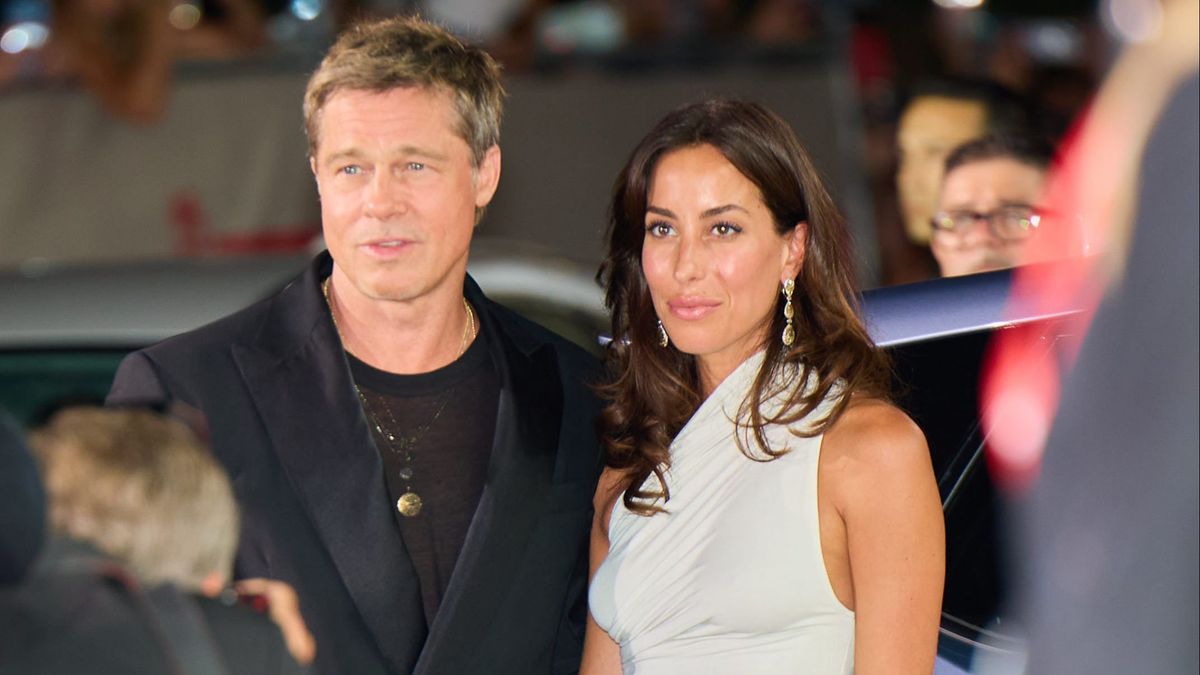 Brad Pitt e Inés de Ramón en el Festival de Venecia.