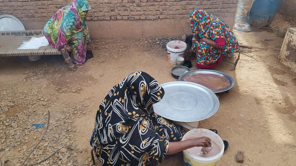 Un grupo de mujeres cocinan en Omdurmán, Sudán