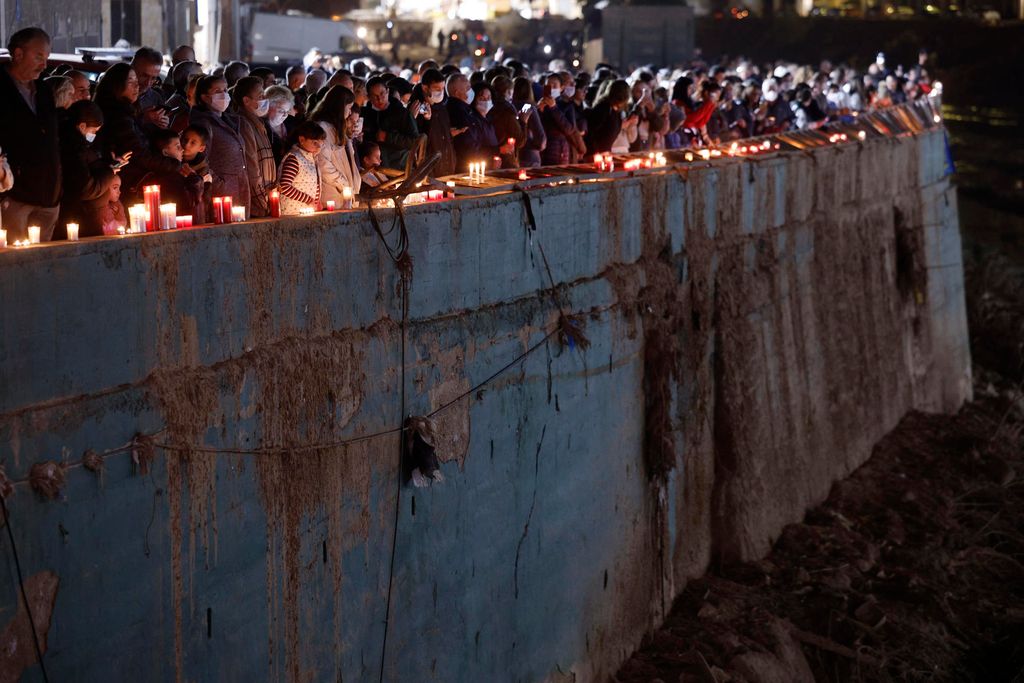 Fotogalería| Las campanas de Paiporta y el barranco del Poyo lloran por los fallecidos por la DANA, un mes después de la tragedia