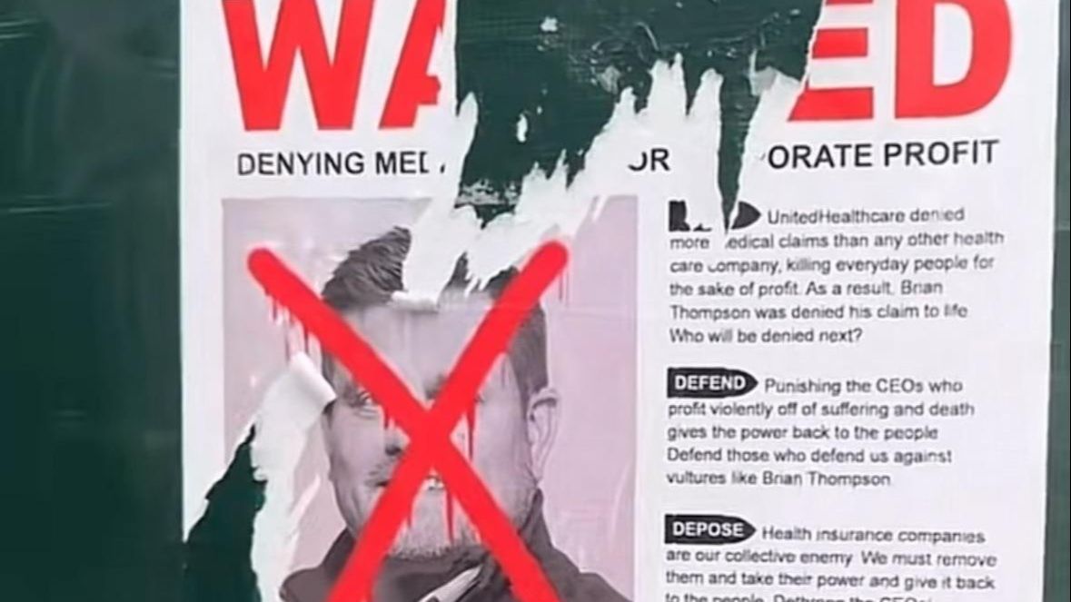 Cartel de "Se busca" con la cara de Brian Thompson tachada