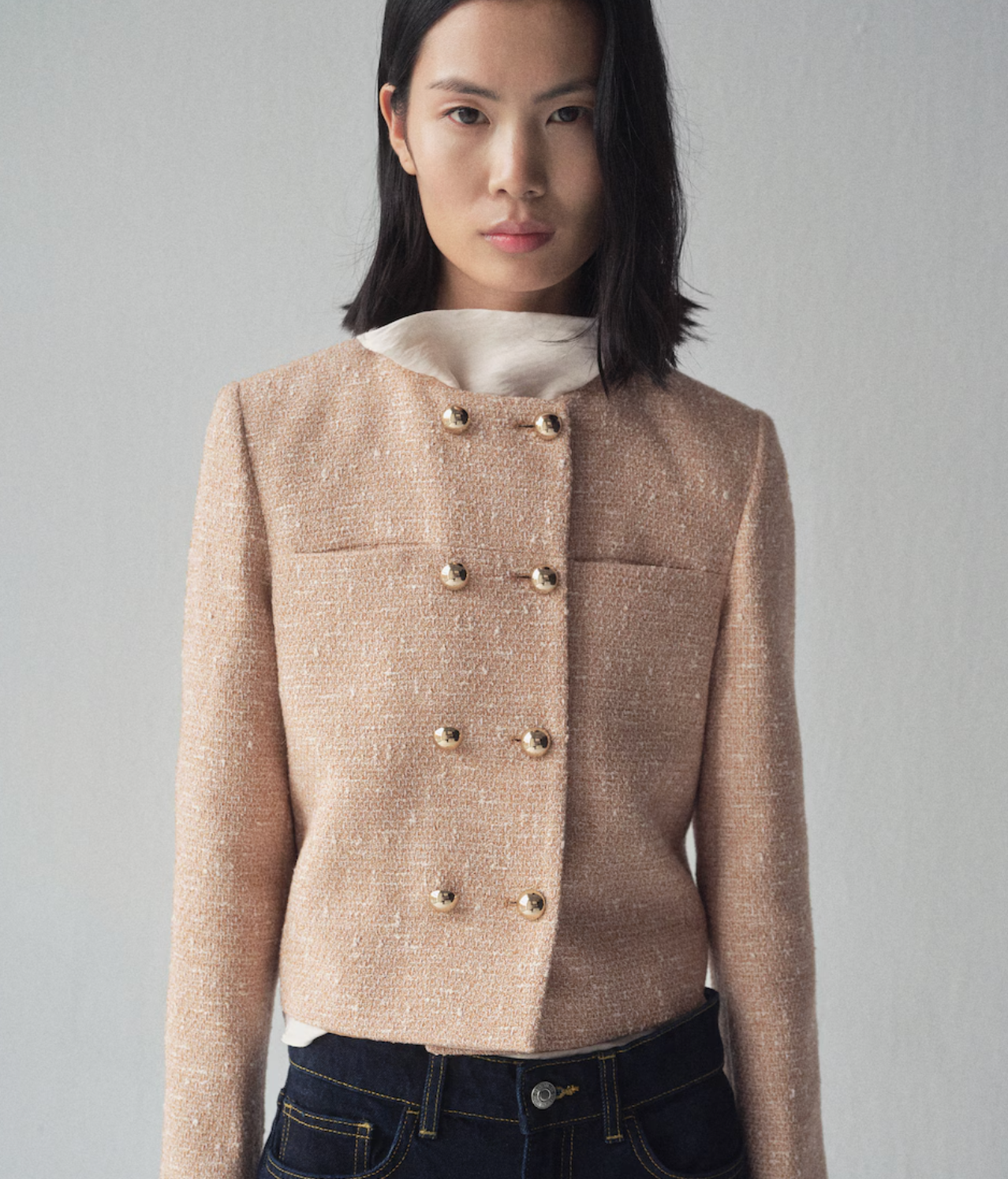 Chaqueta con doble botonadura dorada