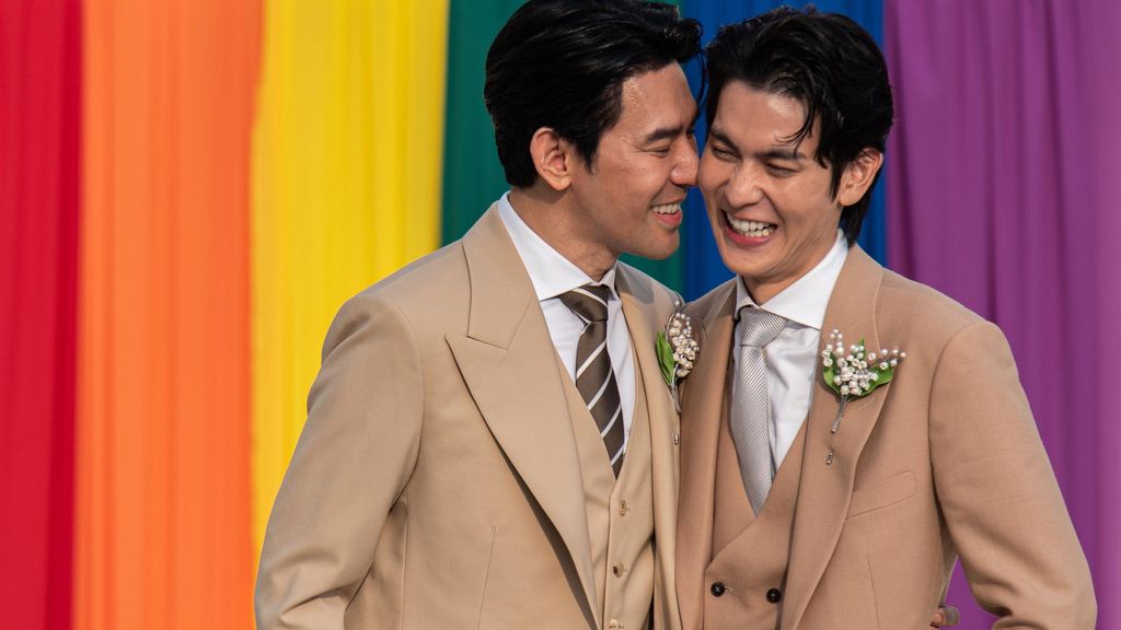 January 23, 2025, Bangkok, Thailand: Thai LGBT couple, Thai actors, Apiwat  Apiwatsayree (L) and Sappanyoo  Panatkool (R) seen pose for a photo after registering their same-sex marriage at the Phra Nakhon district office in Bangkok. Thailand is the first