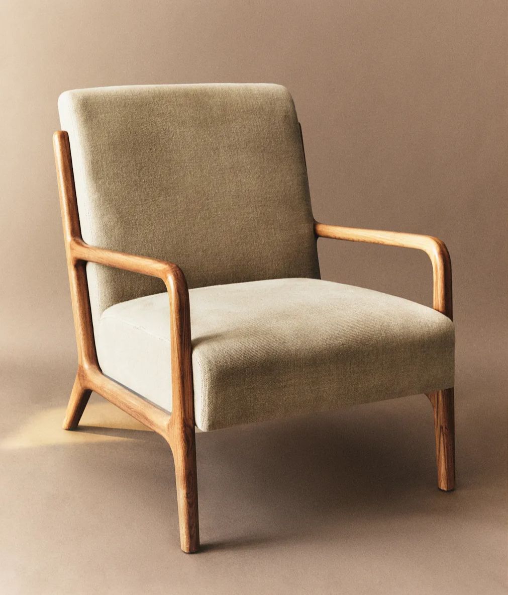 Sillón tapizado en lino