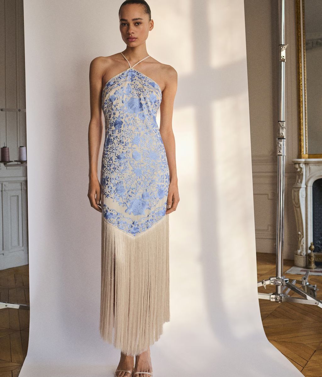 Vestido con falda de flecos
