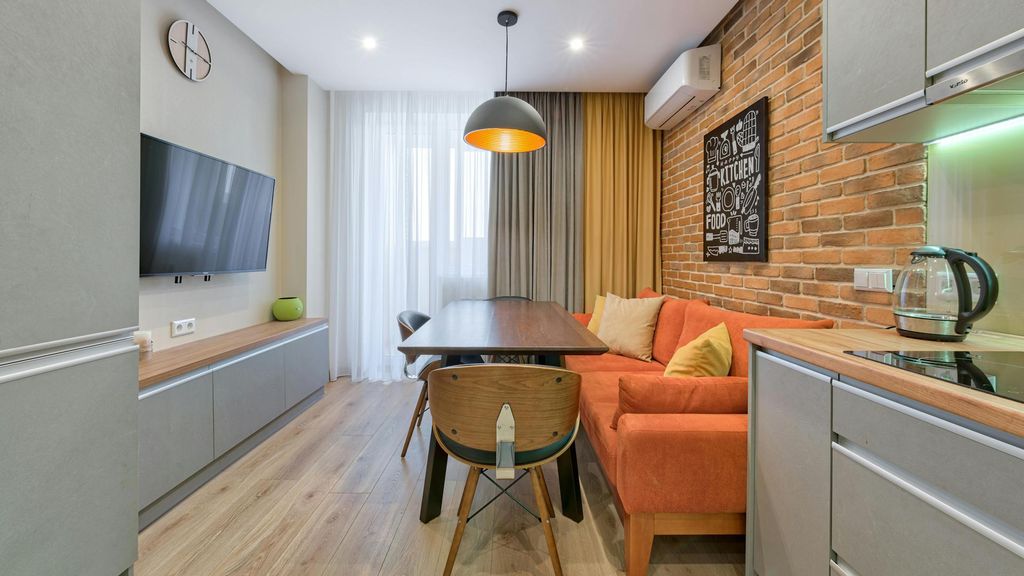 Apartamento pequeño, con la cocina dentro del salón