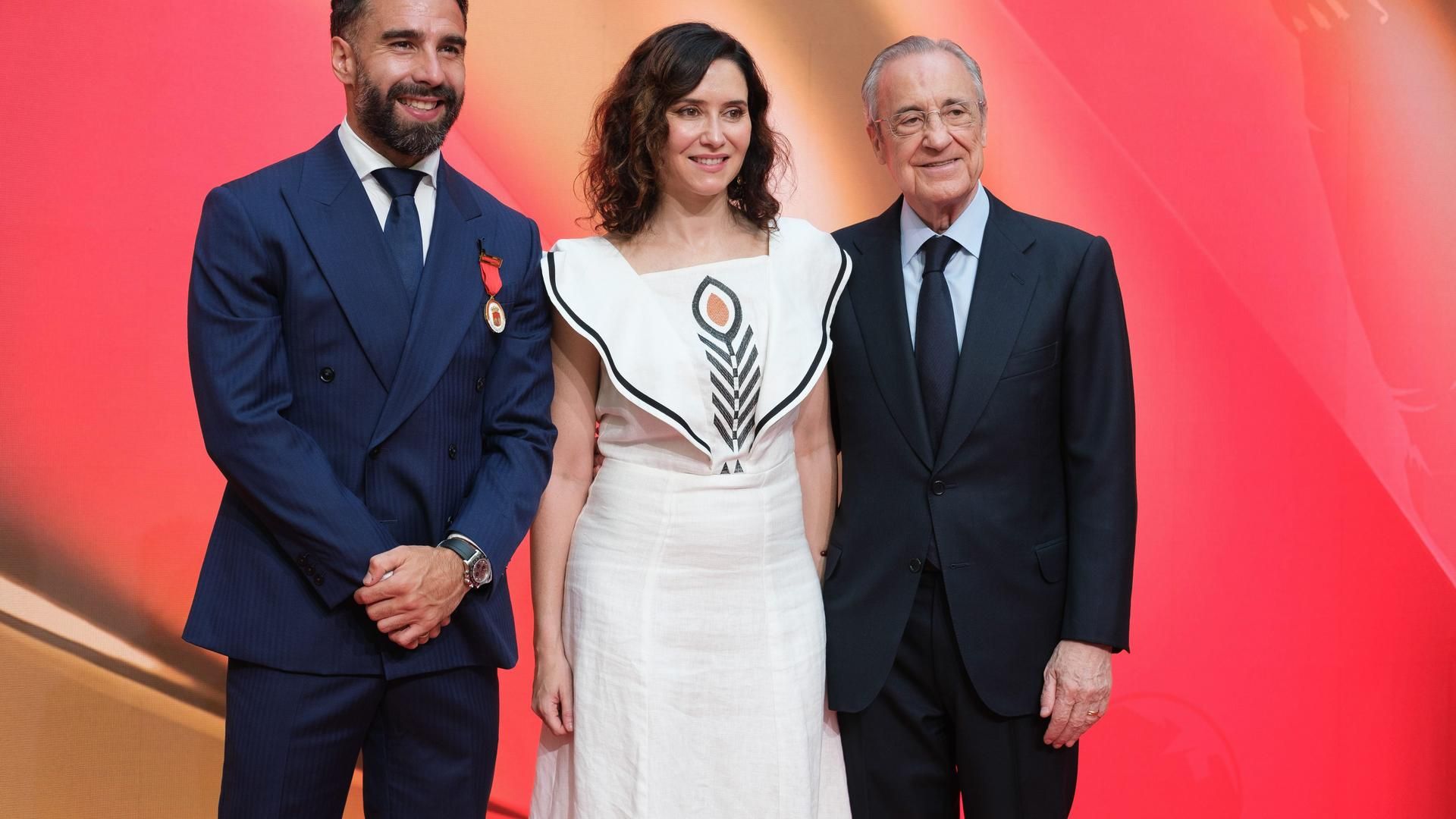 Dani Carvajal, Isabel Díaz Ayuso y Florentino Pérez