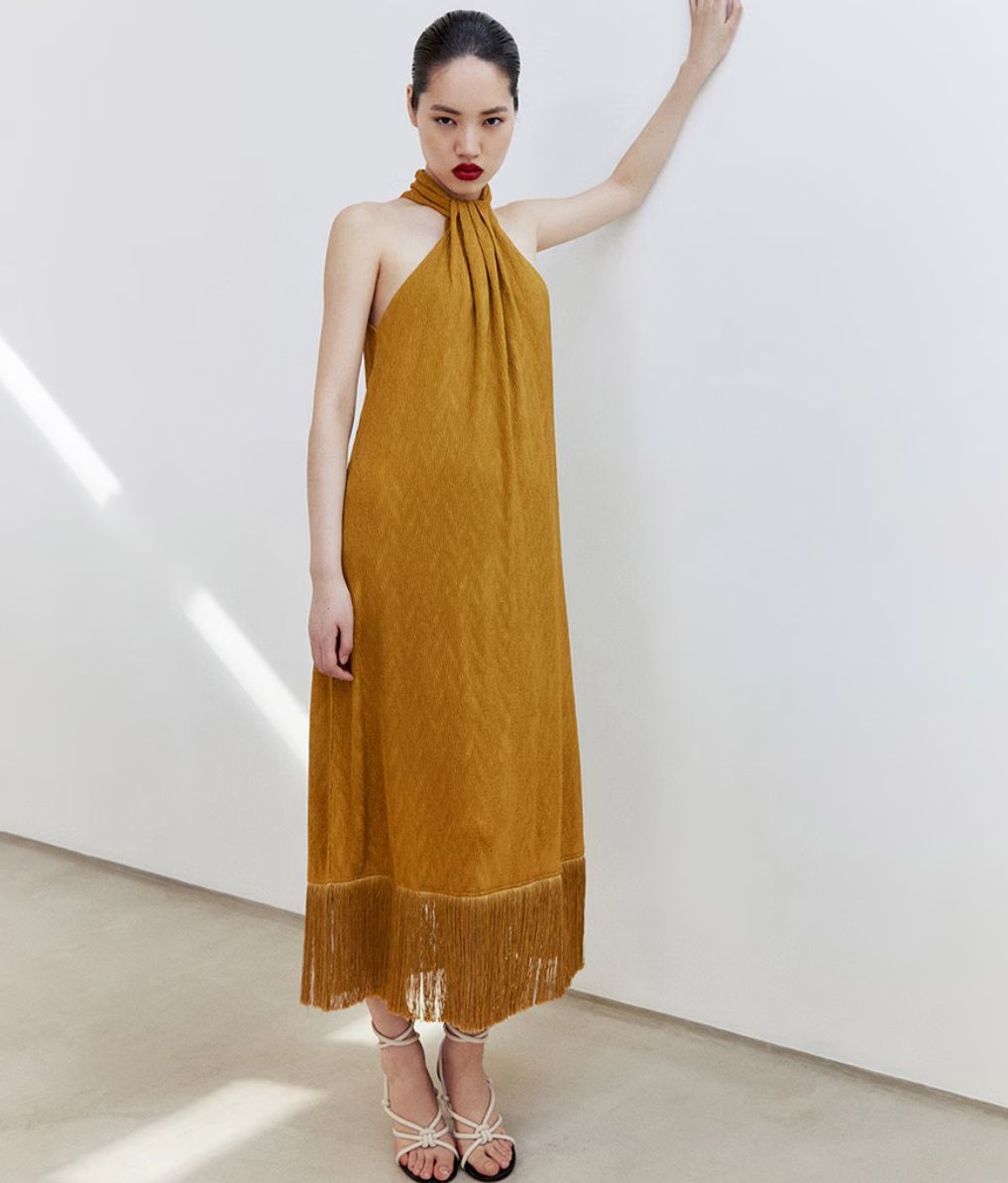 Vestido con flecos de Sfera