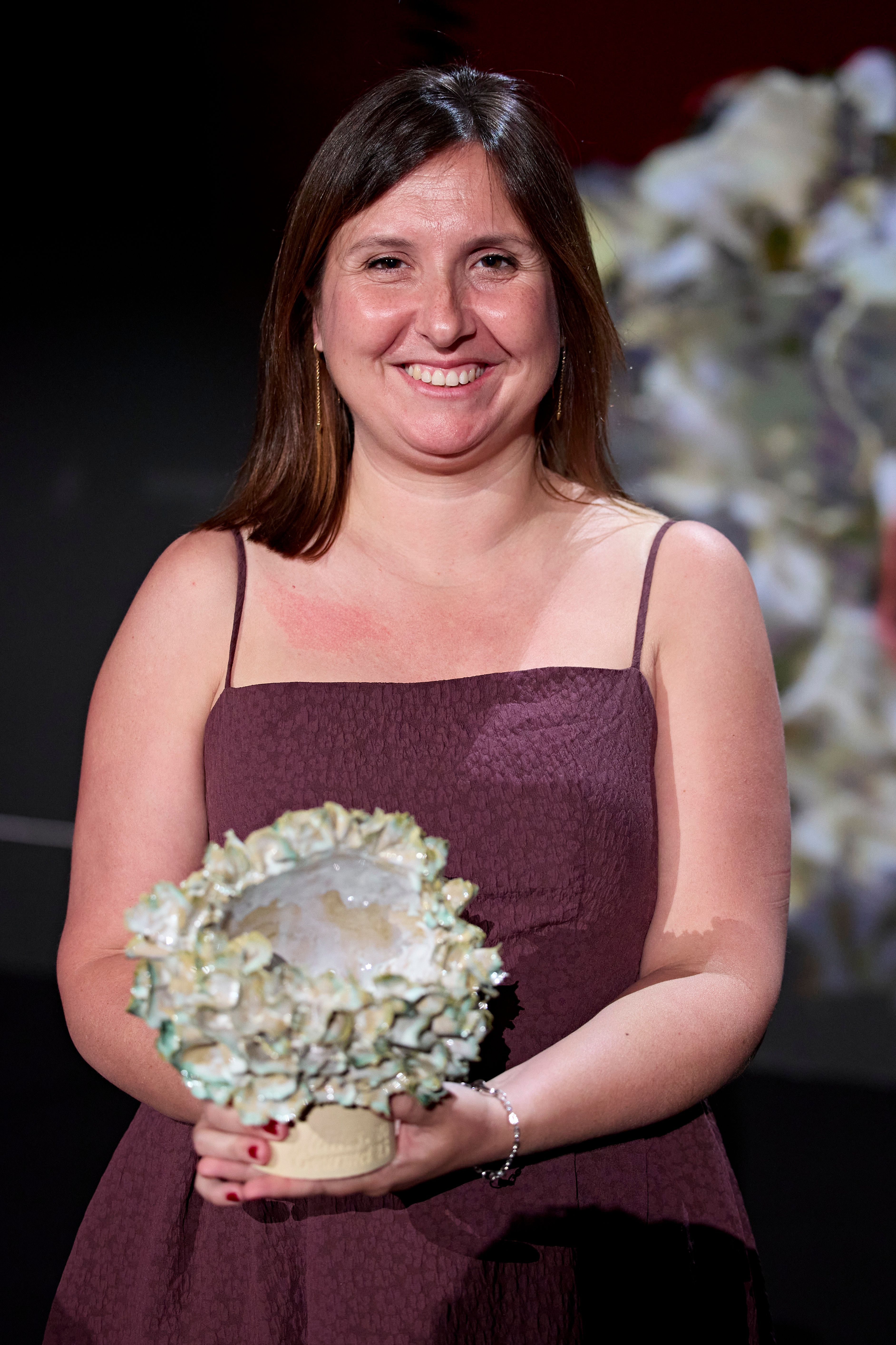 Anna Pérez, Marketing Manager de Lindt & Sprüngli, con el premio Premios Planes Gourmet a mejor trayectoria de marca