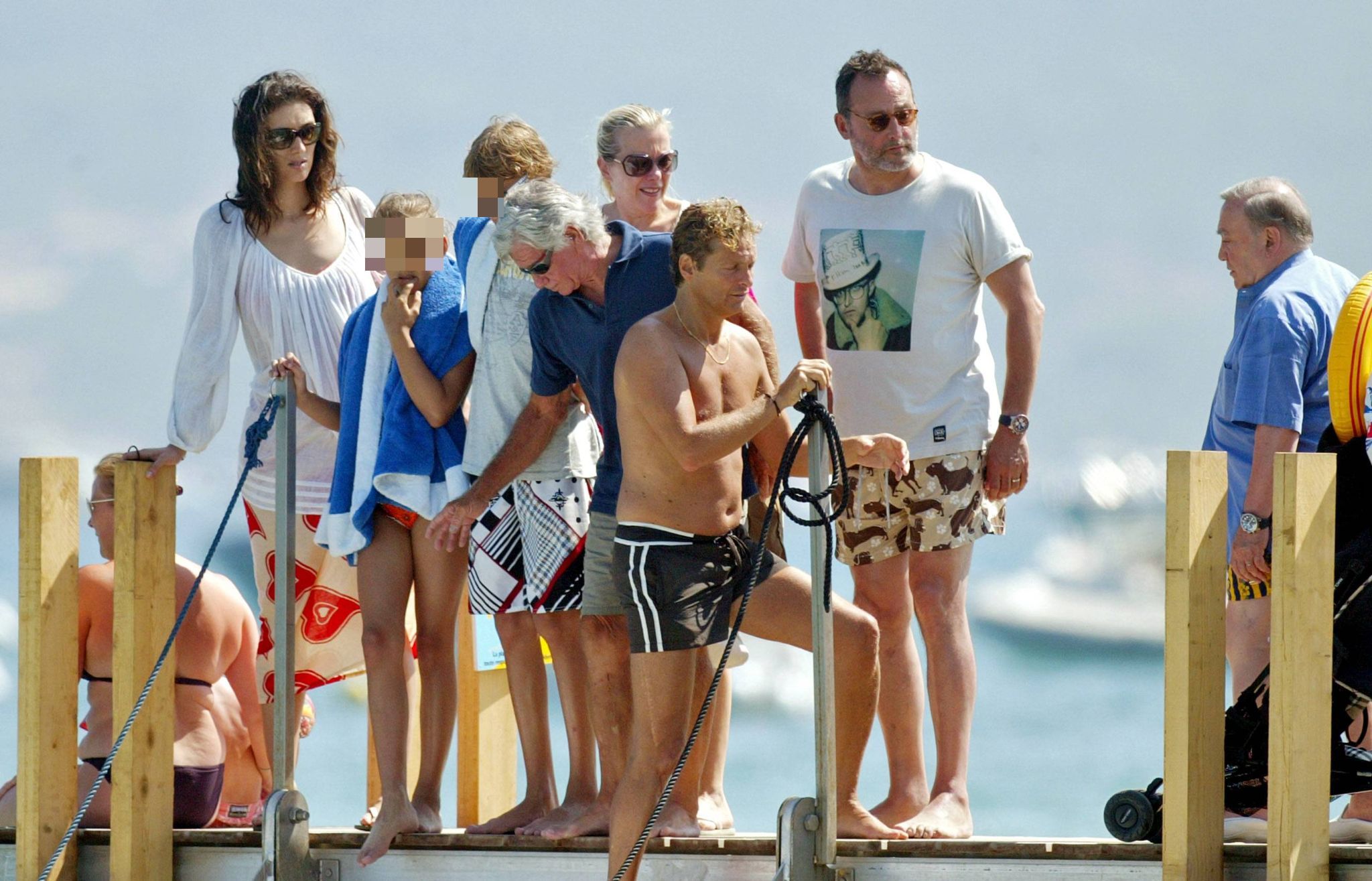 Jean y su mujer con dos de sus hijos y familia, disfrutando de unas vacaciones a bordo de un yate