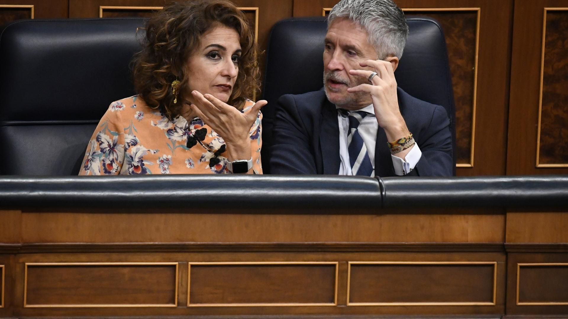 La vicepresidenta primera y ministra de Hacienda, María Jesús Montero y el ministro de Interior, Fernando Grande-Marlaska, son dos de los ministros con datos firtrados