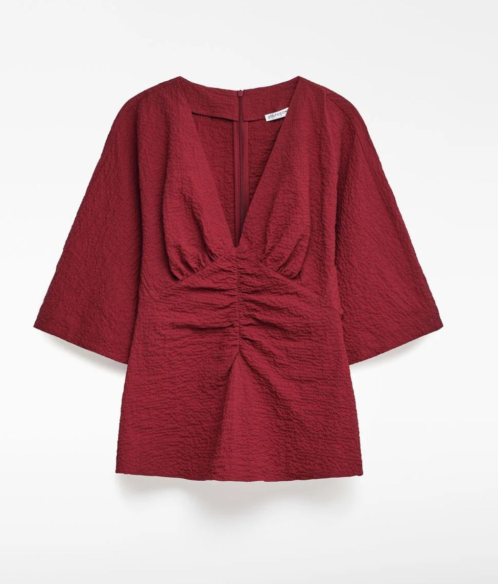 Blusa peplum de algodón