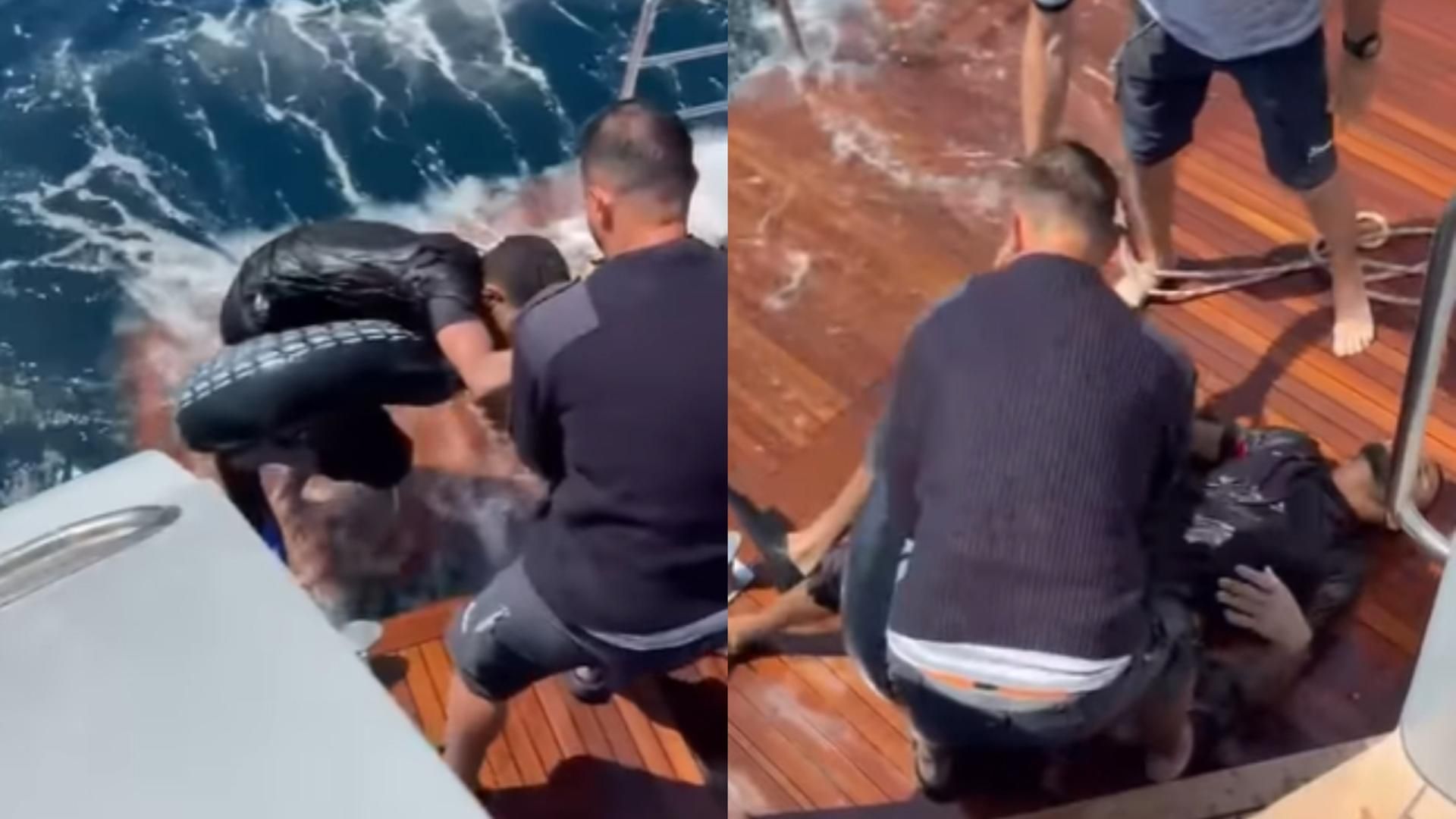 Momento del rescate de una persona que intentaba cruzar el Estrecho a nado