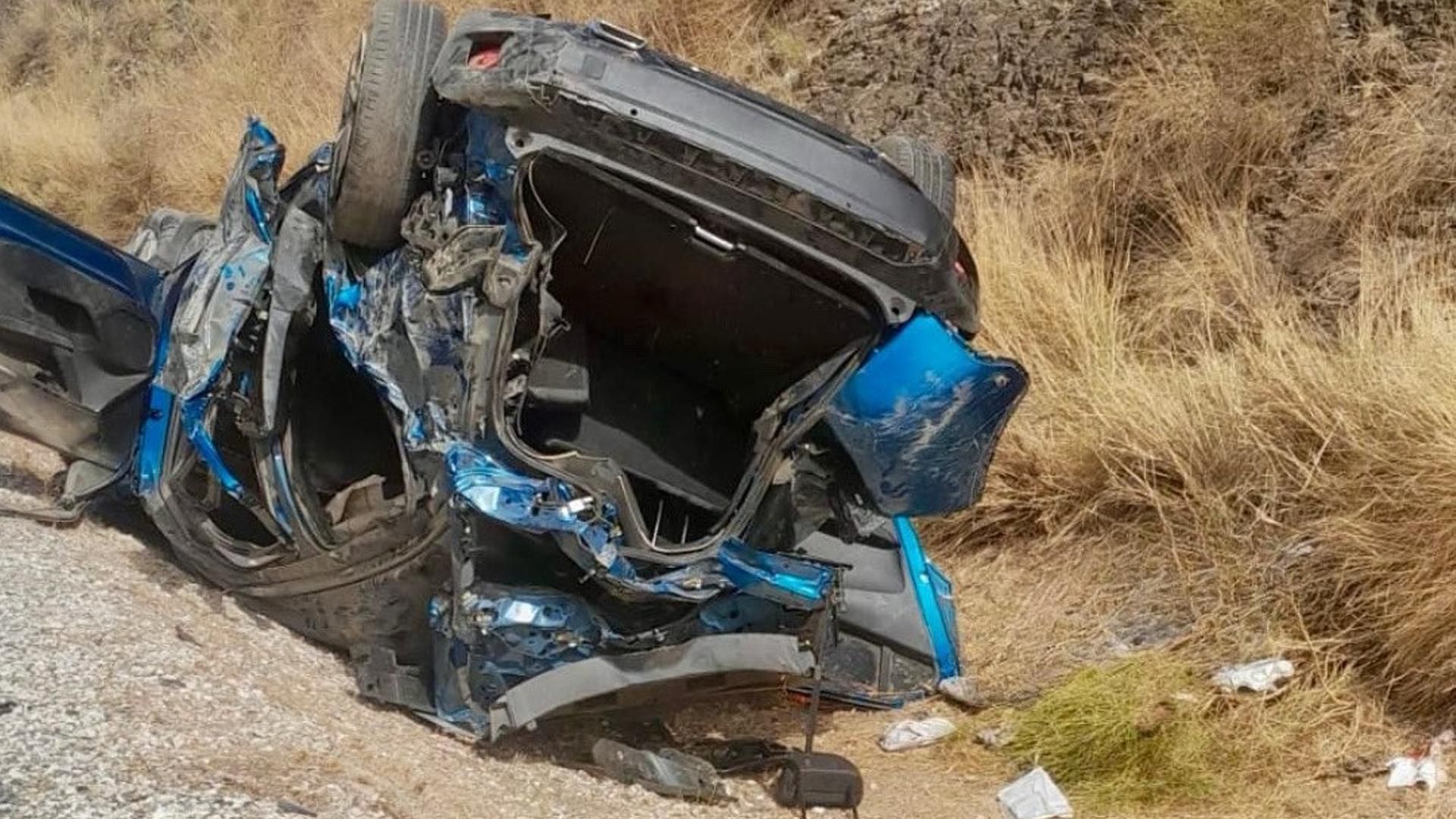 Coche volcado tras un accidente de tráfico