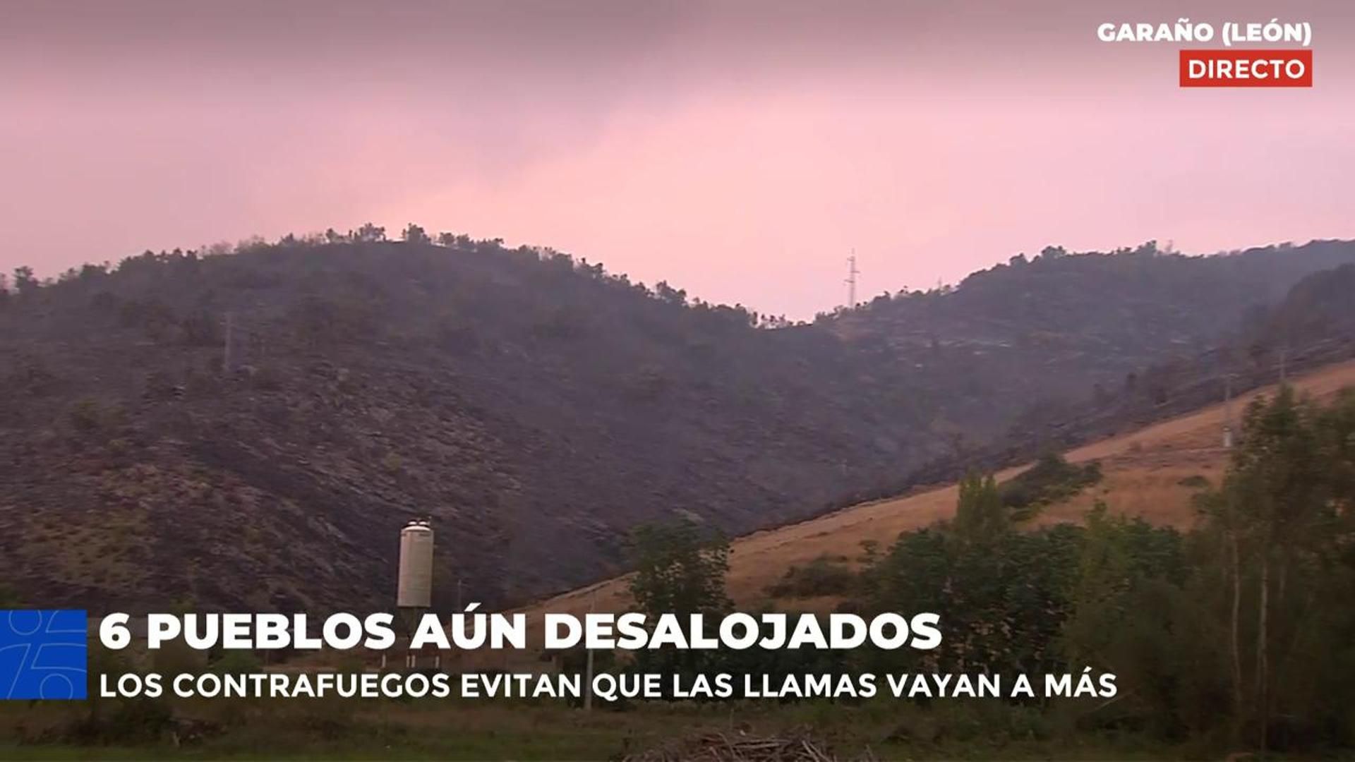 Seis pueblos continúan desalojados por el incendio de Garaño, León, donde están pendientes del viento