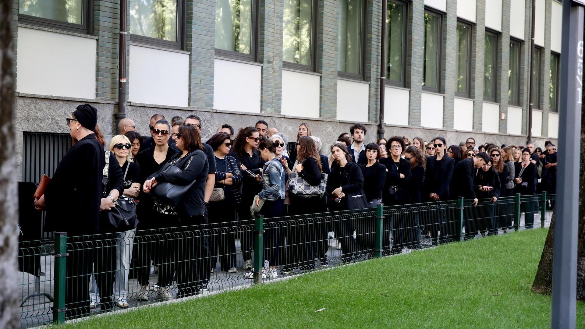 People queue to pay their respects to late Italian fashion designer Giorgio Armani at his funeral chapel in Milan