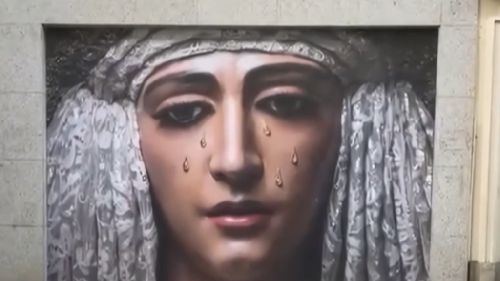 Mural con la imagen de la Esperanza de Triana en el barrio de Los Remedios