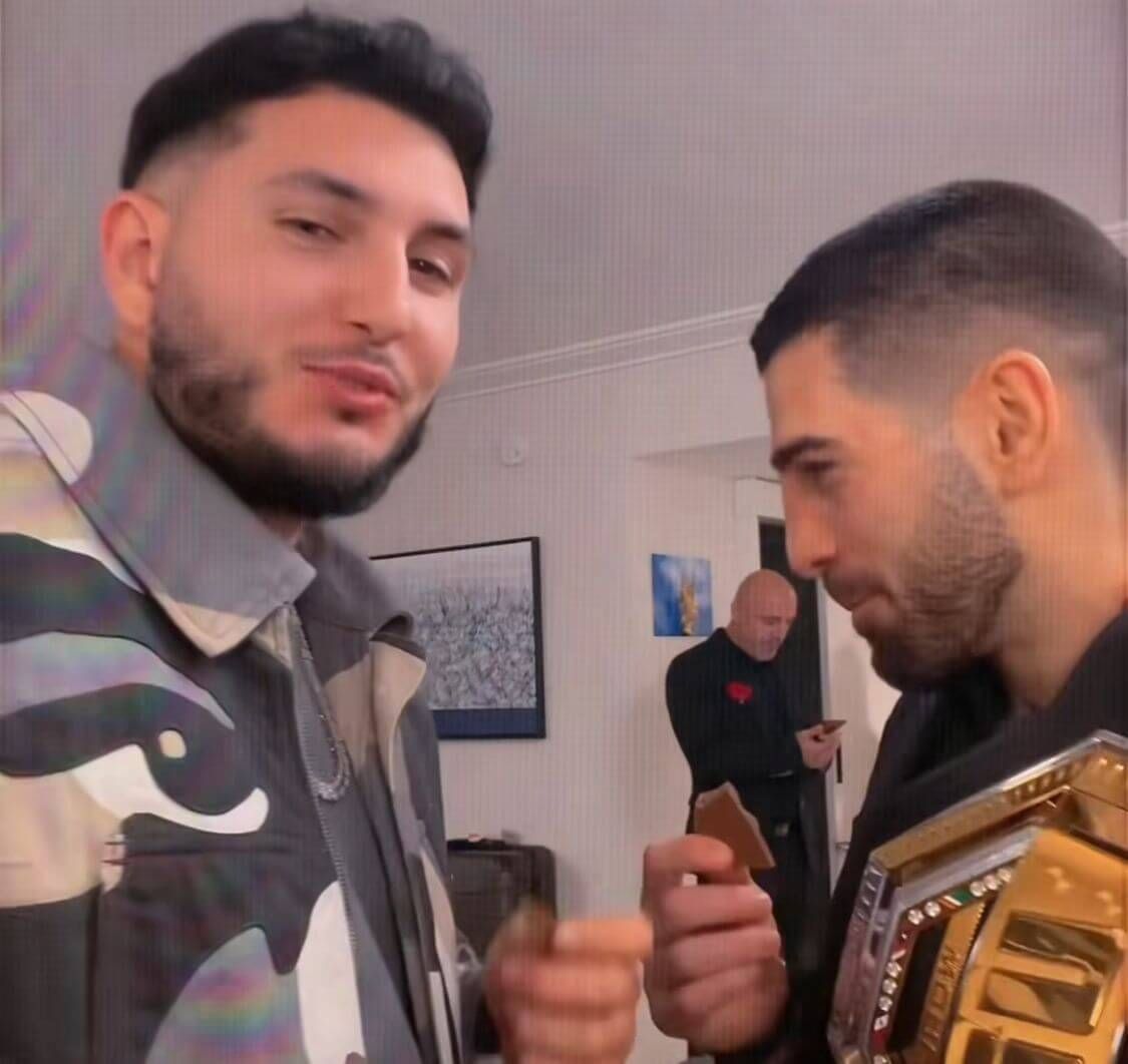  Omar Montes junto a Ilia Topuria en la celebración del cinturón.