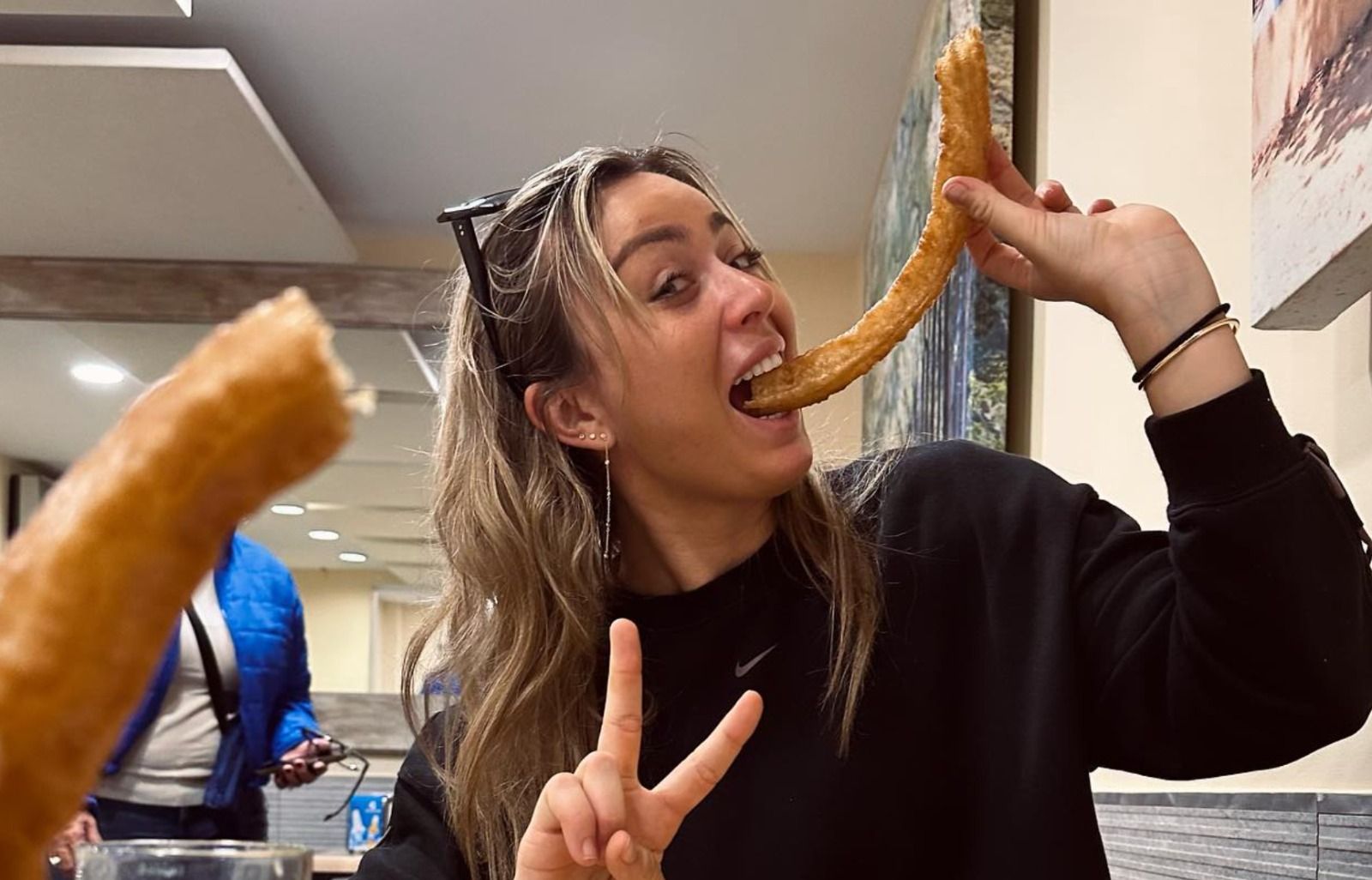  Paula Badosa comiendo churros en Sevilla.