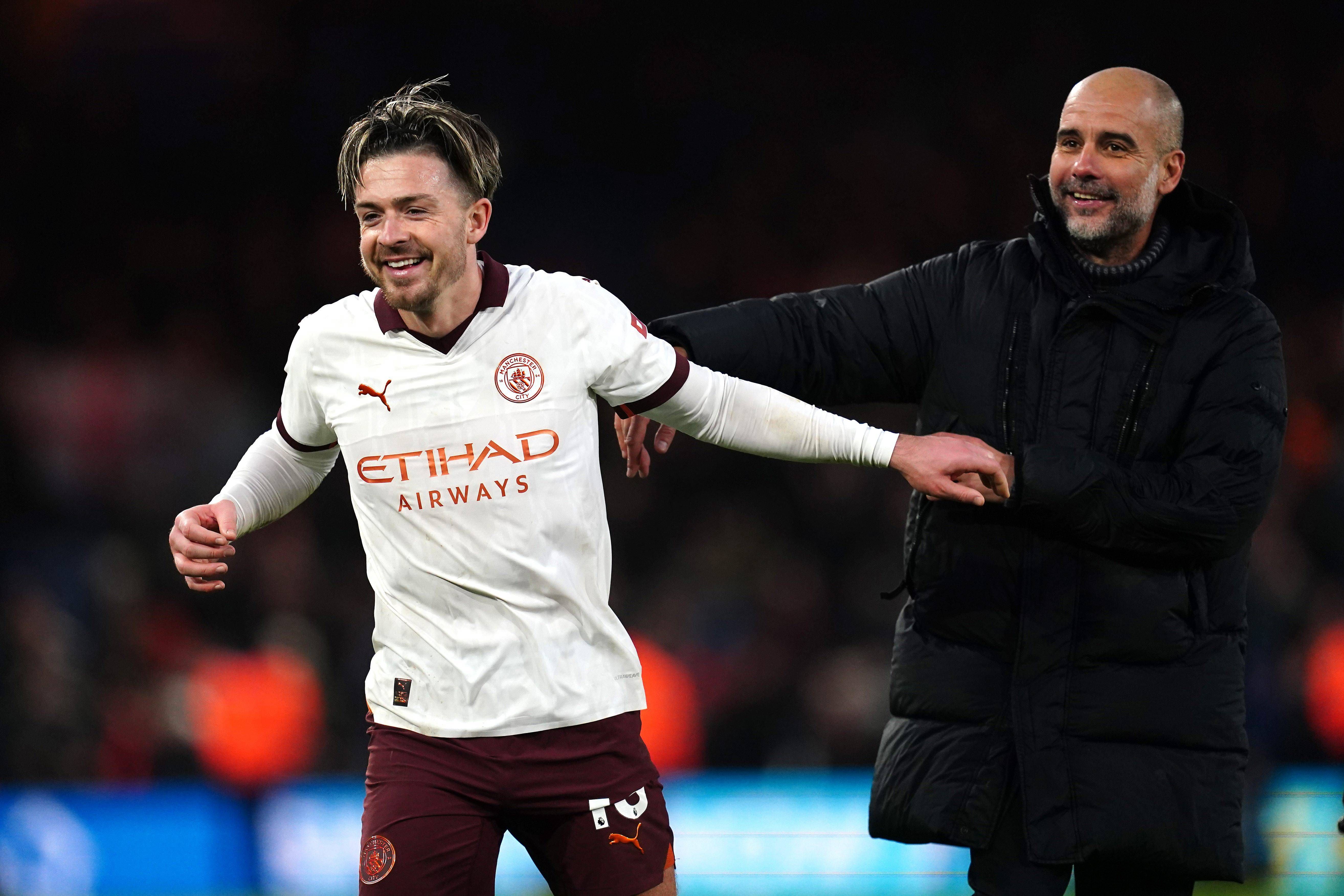 Jack Grealish junto a su entrenador, Pep Guardiola (Cordon Press)
