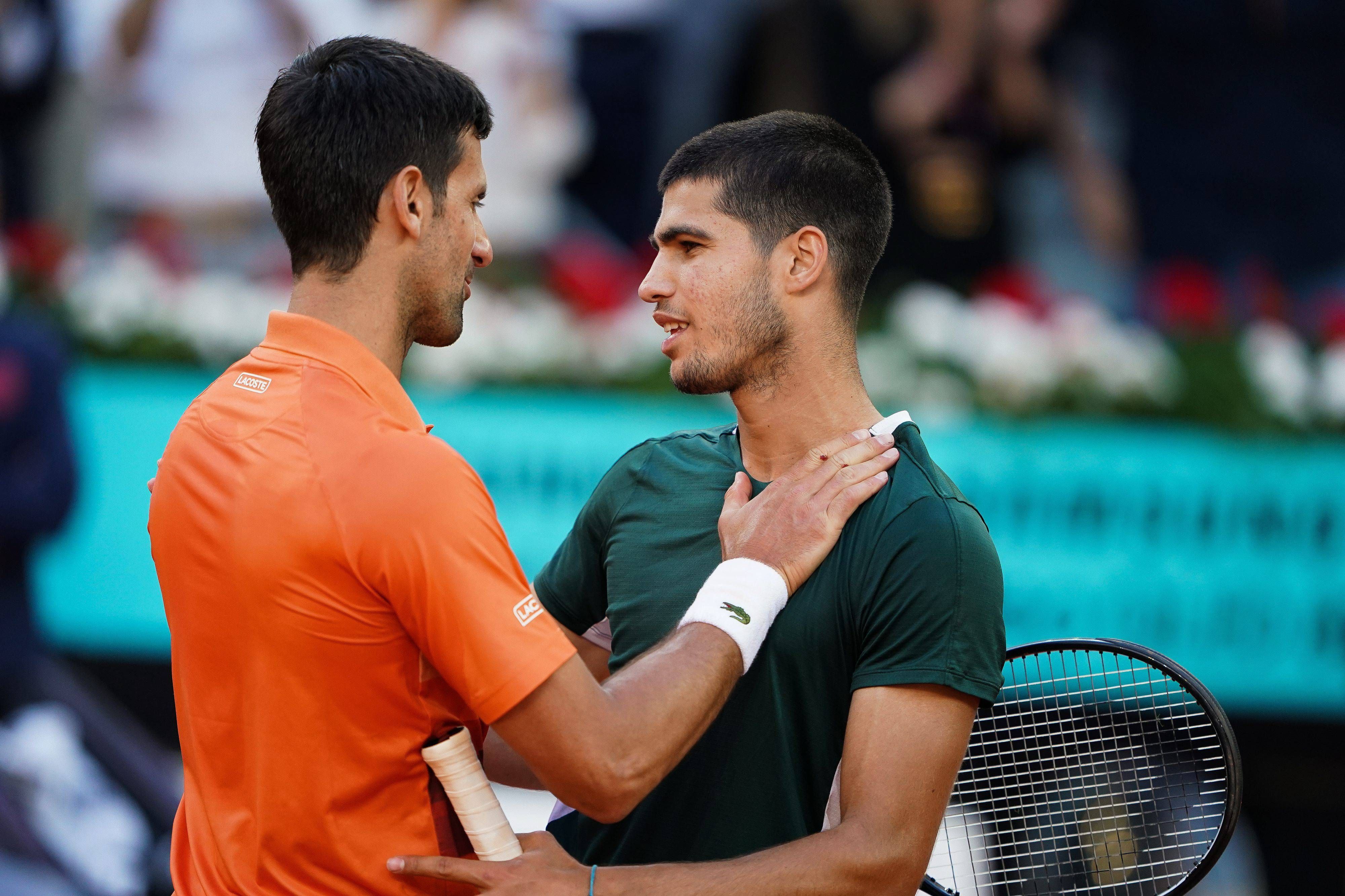  Novak Djokovic y Carlos Alcaraz, en el partido de Madrid en 2022