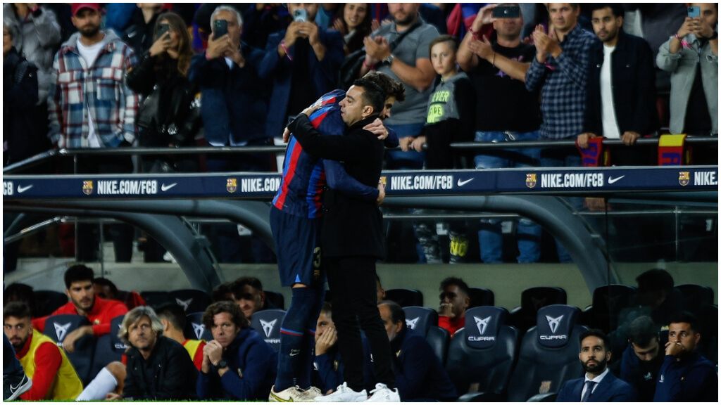  Gerard Piqué y Xavi Hernández, en el Barcelona (foto: Europa Press).