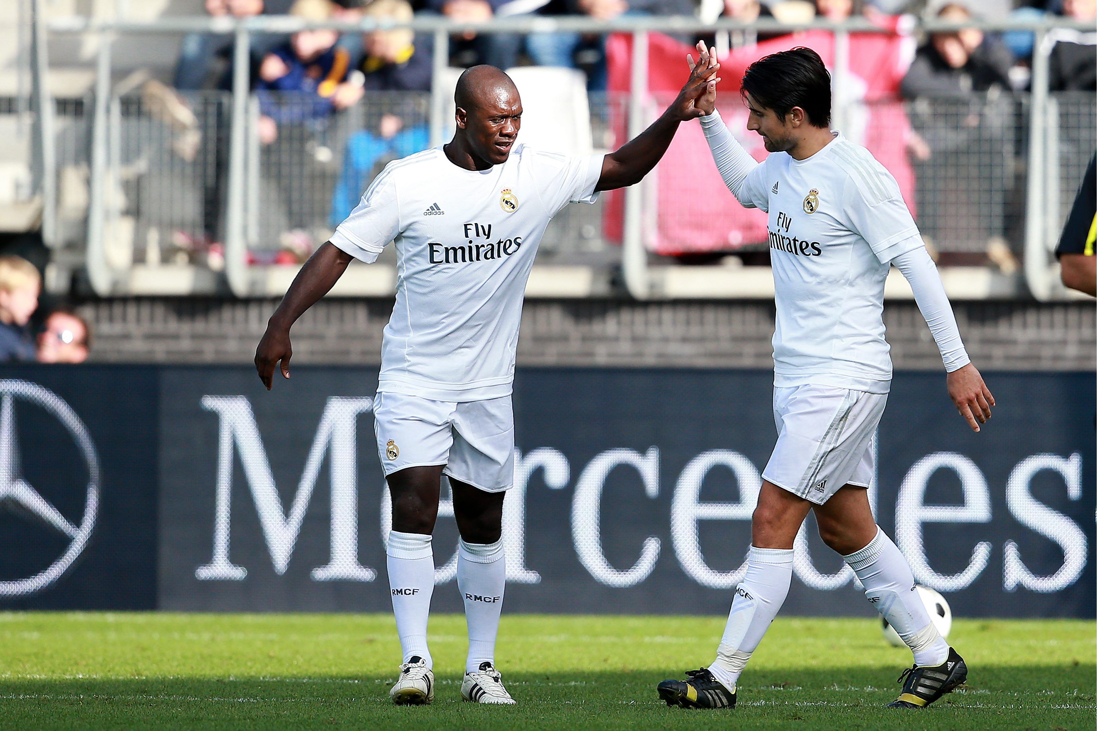 Rubén de la Red y Clarence Seedorf, en un partido con la camiseta del Real Madrid (Cordon Press)