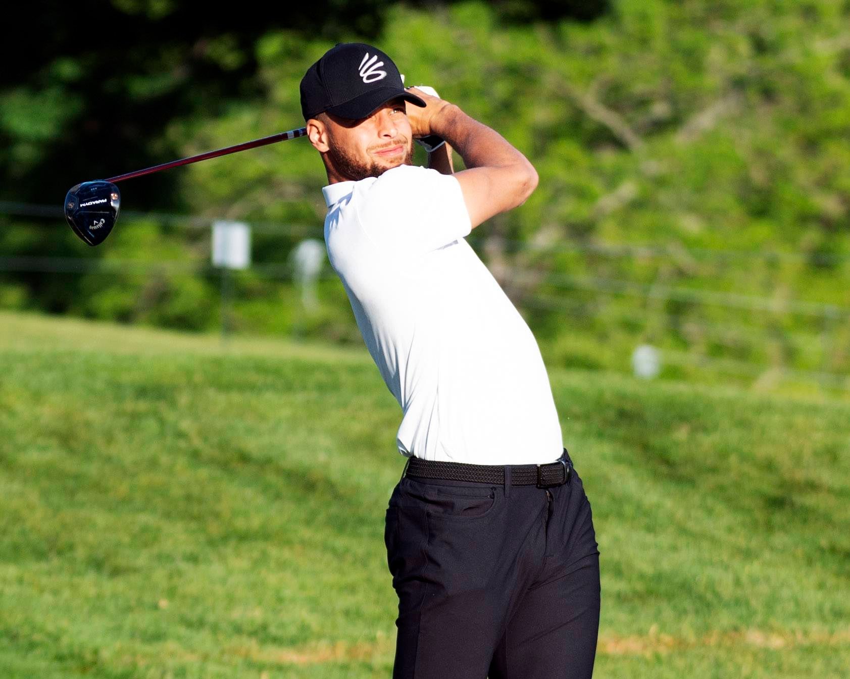  Stephen Curry jugando al golf