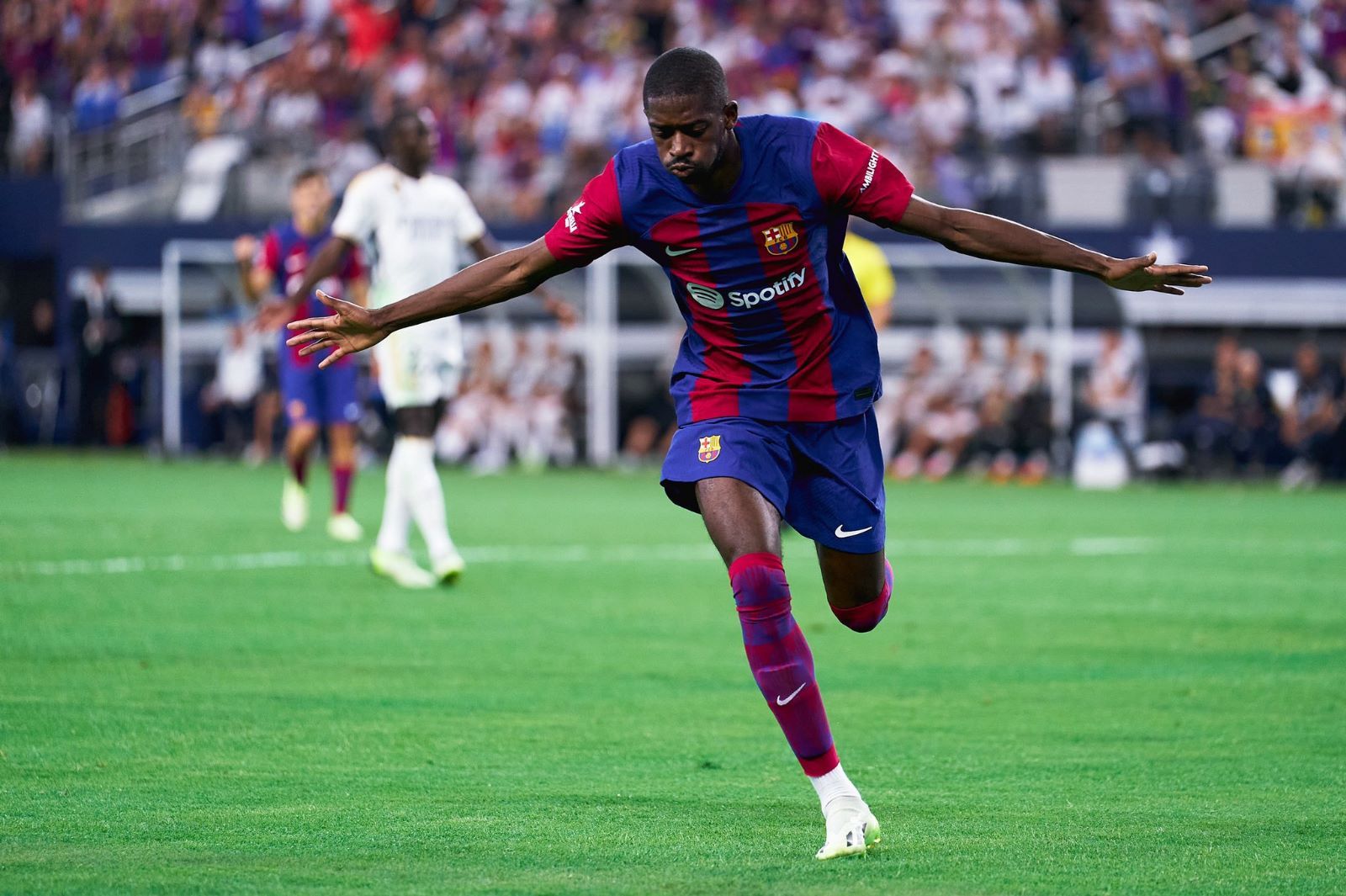 Ousmane Dembélé celebrando su gol ante el Real Madrid en el Clásico de Dallas.