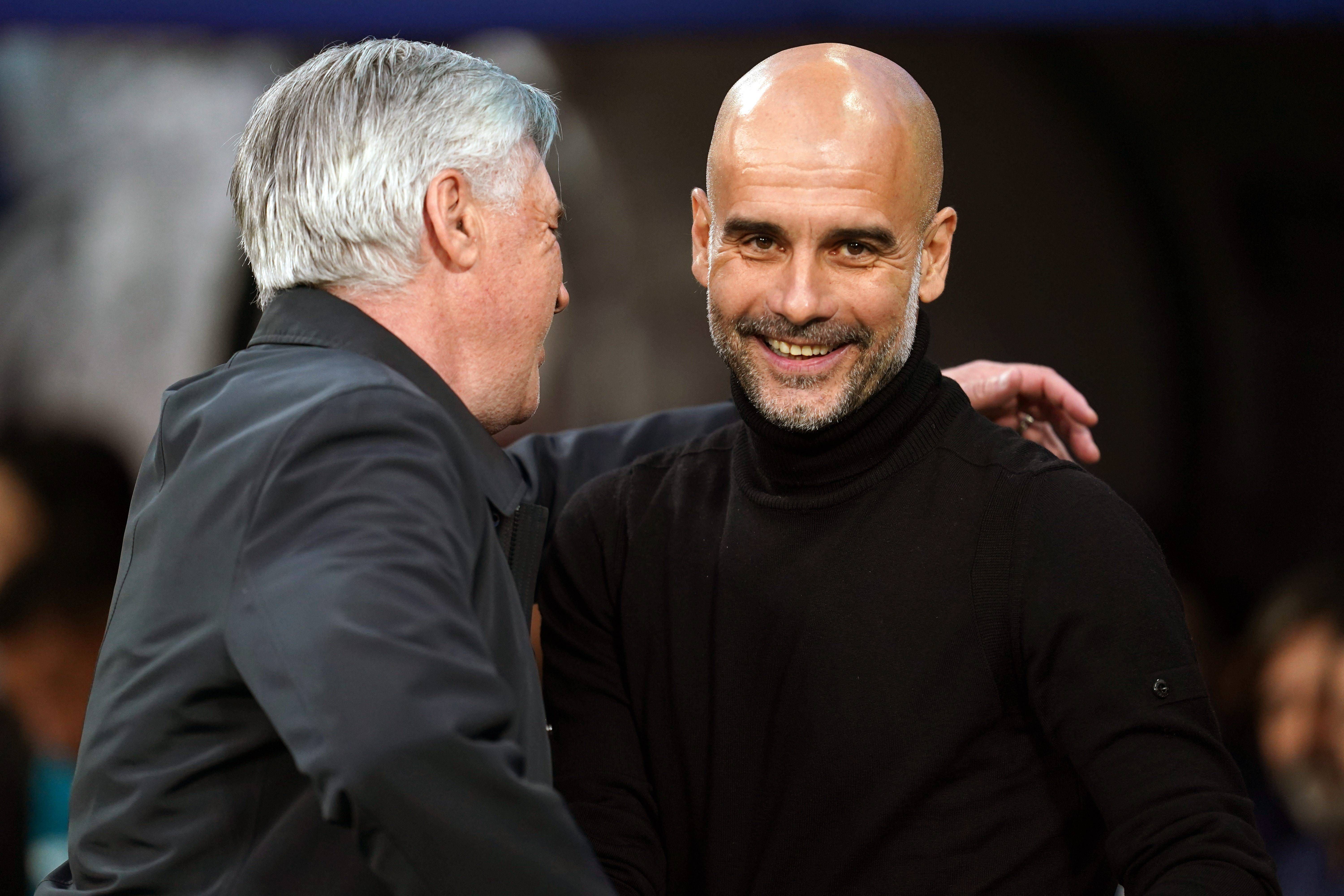 Pep Guardiola y Carlo Ancelotti se saludan en el Bernabéu.