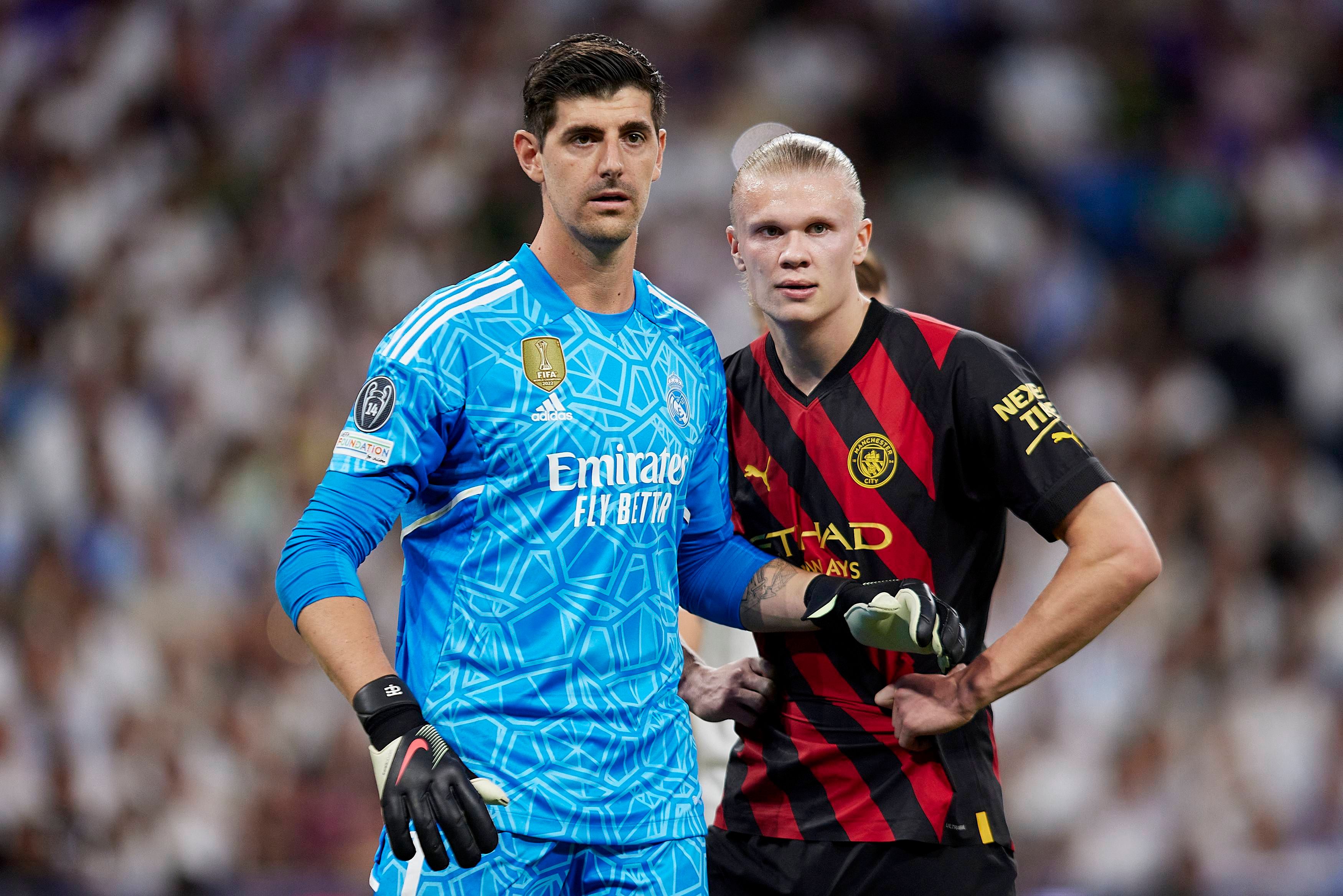  Courtois y Haaland, en el Real Madrid-City (FOTO: Cordón Press).