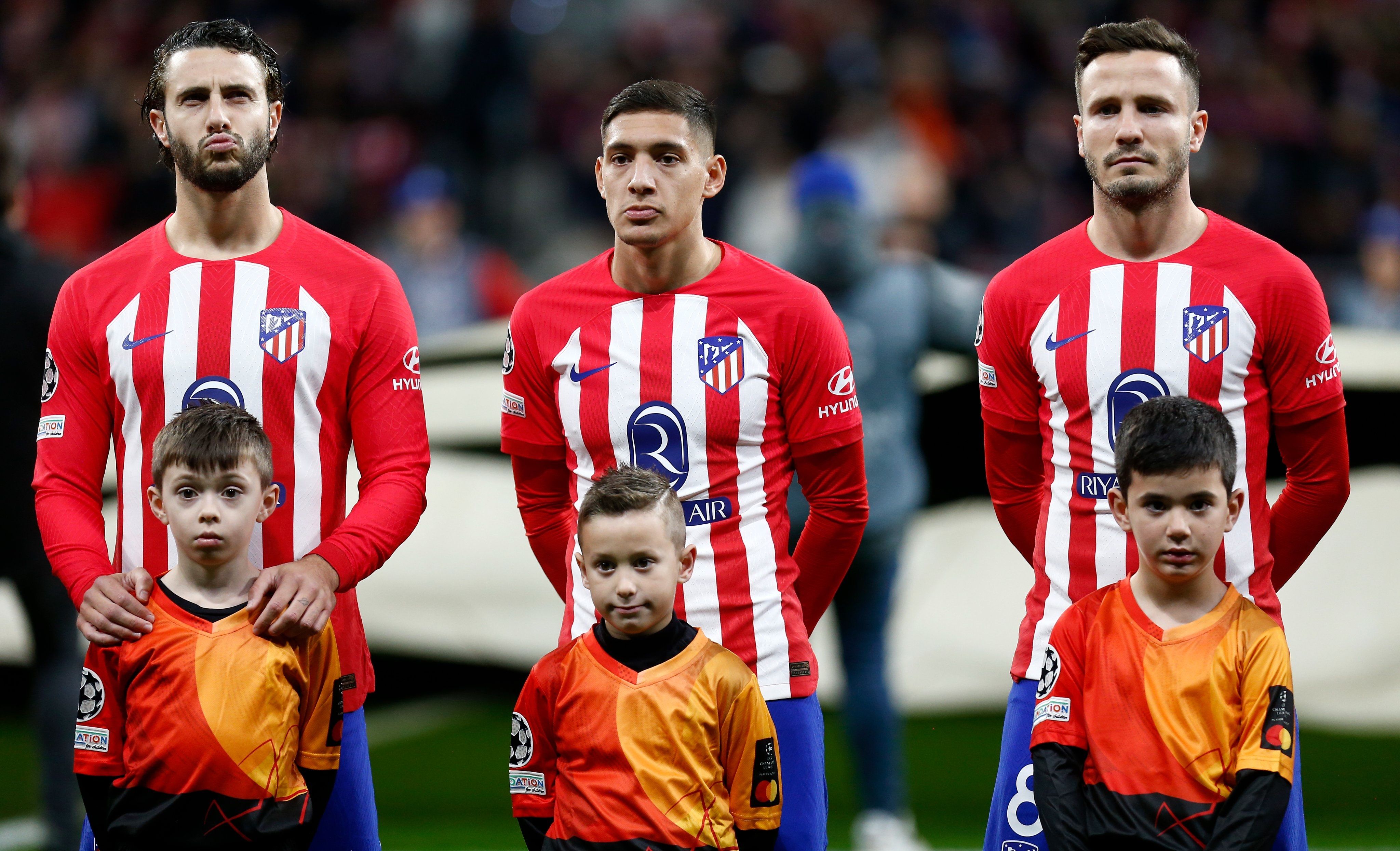 Mario Hermoso, Nahuel Molina y Saúl Ñíguez, en el Atlético-Lazio.