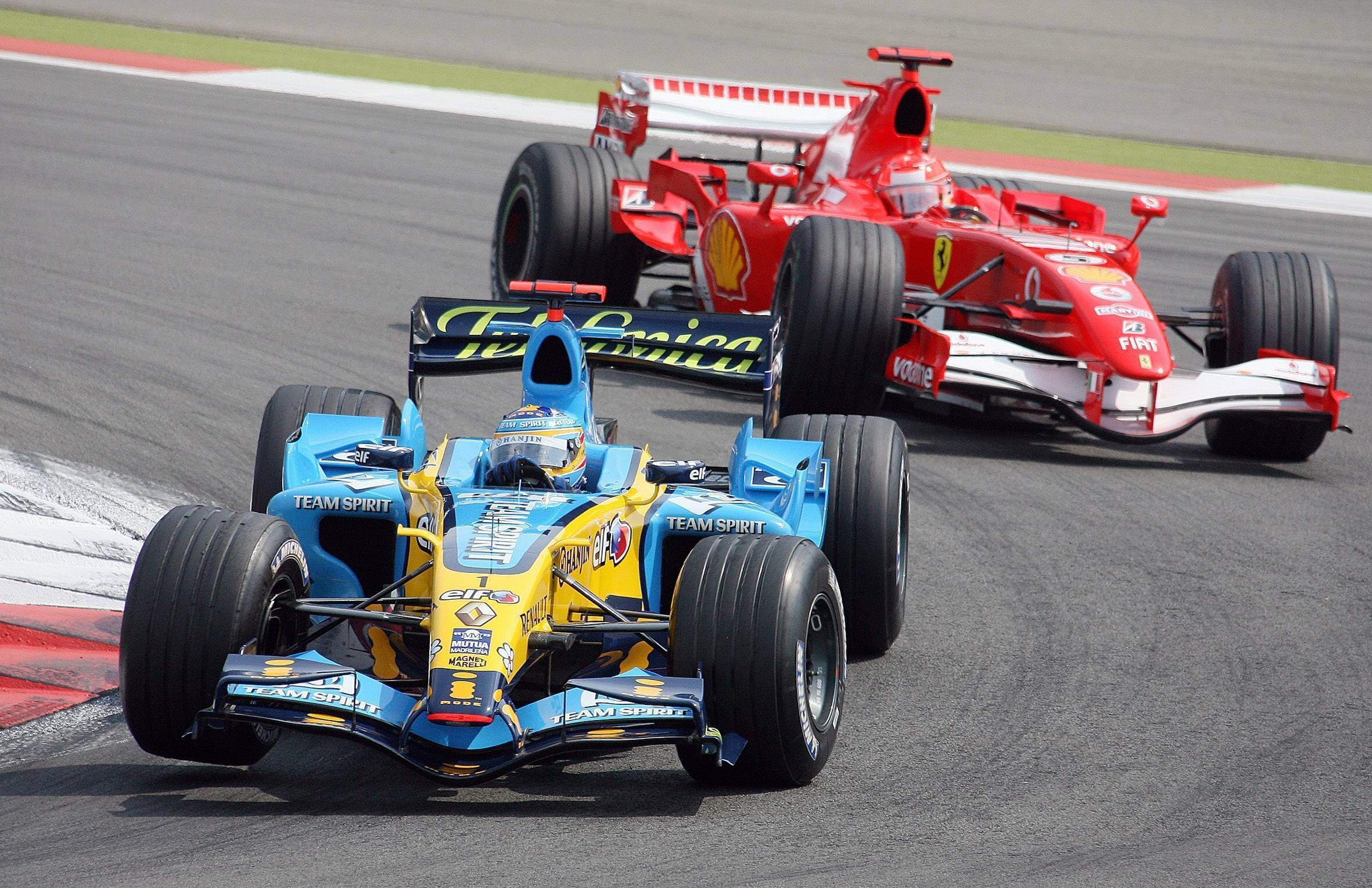  Michael Shumacher y Fernando Alonso, celebrando un podio.