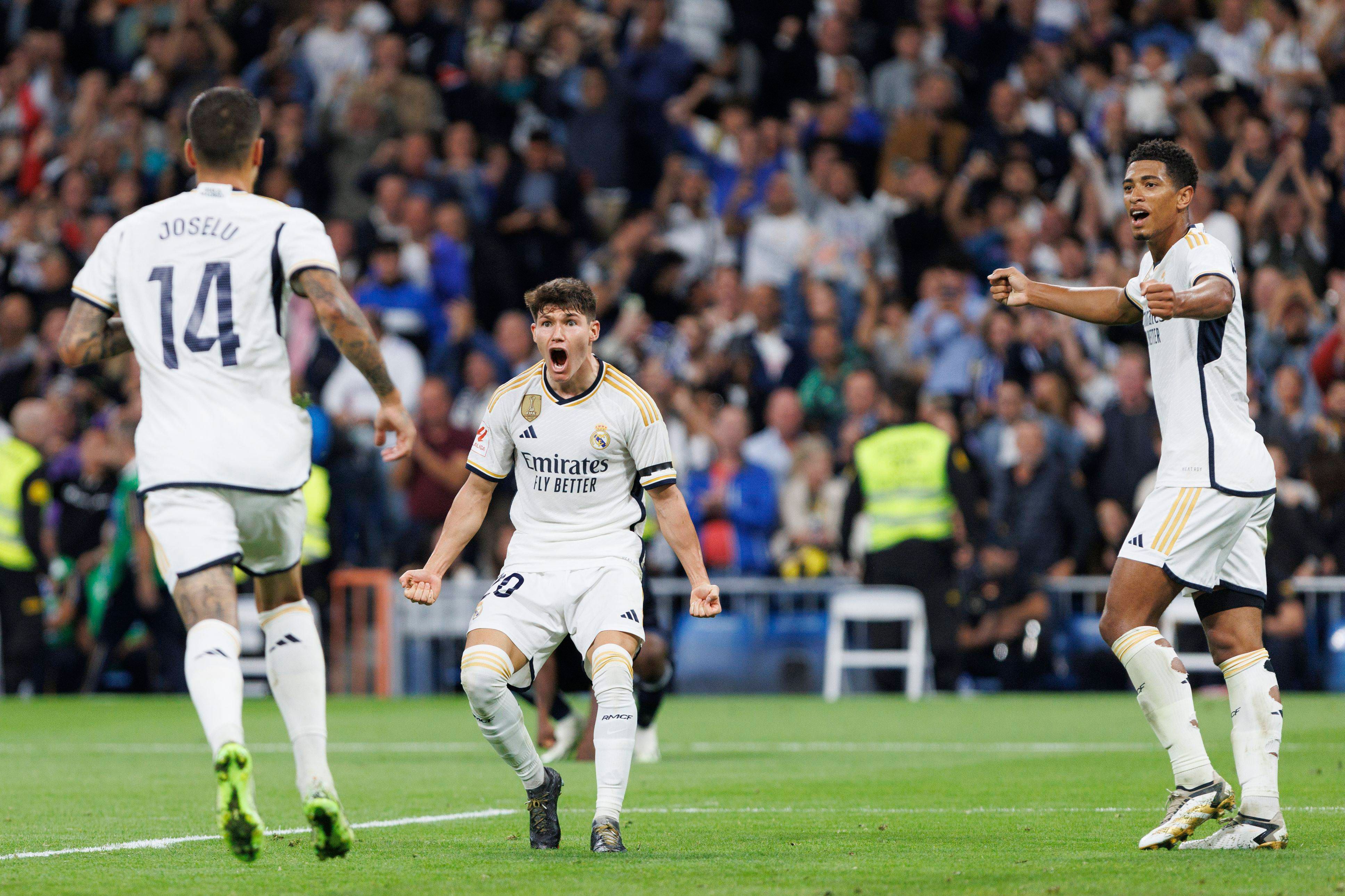  Joselu celebra su gol con Fran García (FOTO: Cordón Press).