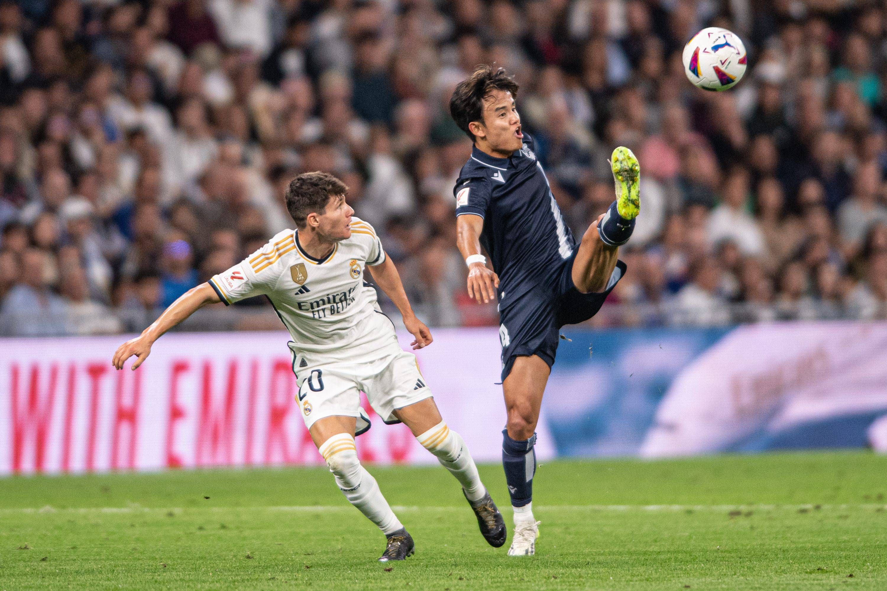 Take Kubo, ante Fran García en el Real Madrid-Real Sociedad.