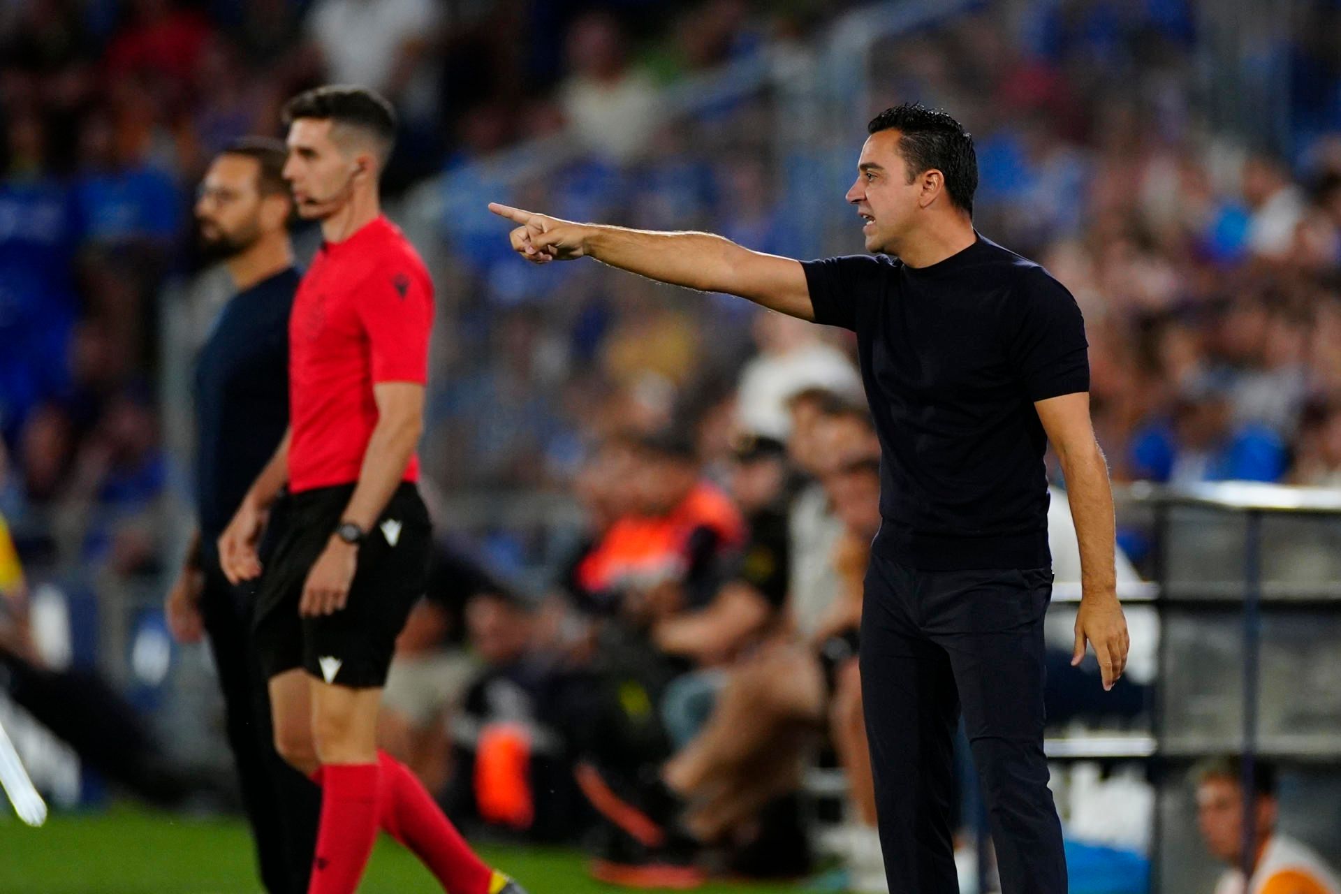 Xavi y Bordalás, en la banda del Coliseum durante el Getafe-Barcelona (FOTO: EFE).