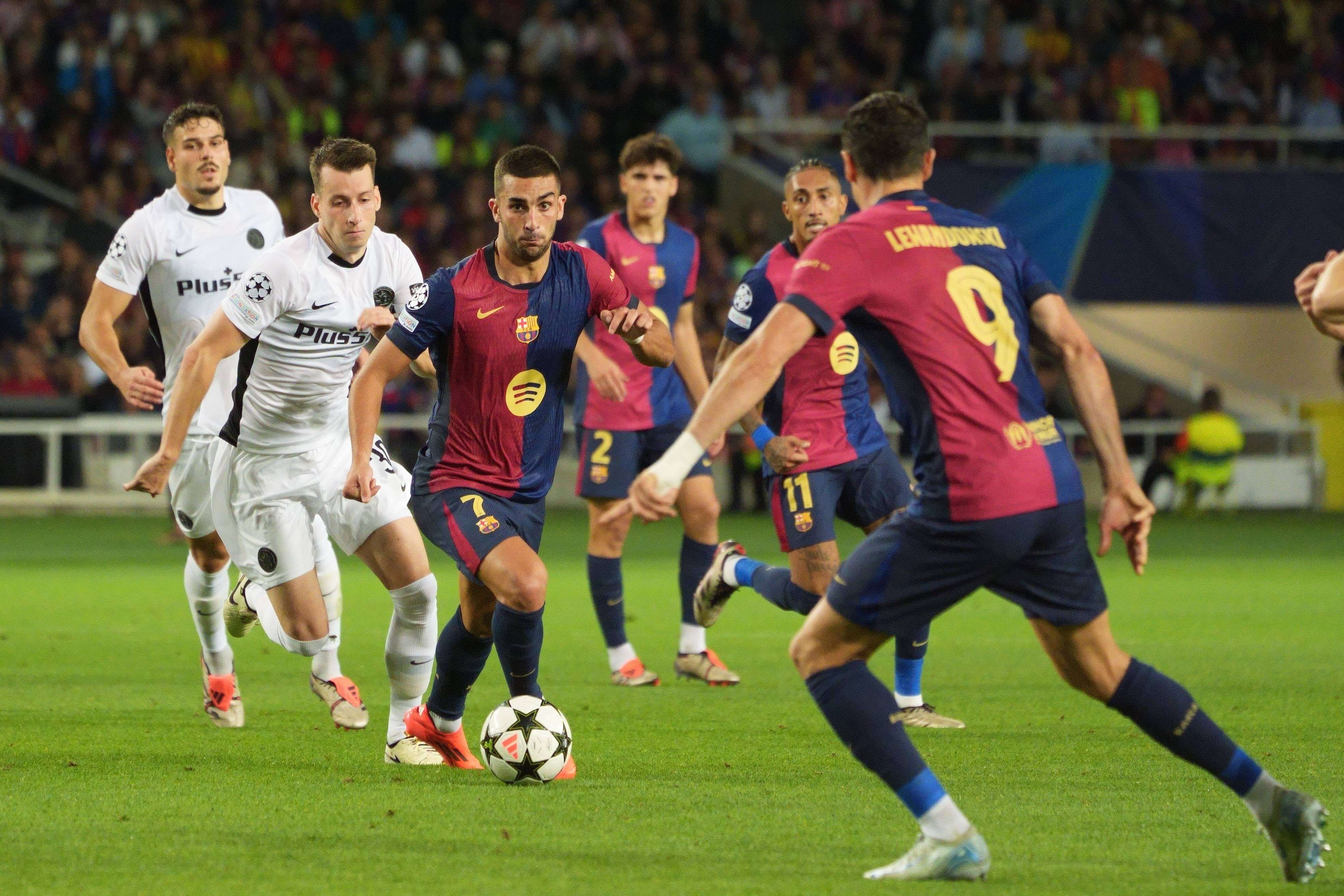 Ferran y Lewandowski en un partido de Champions