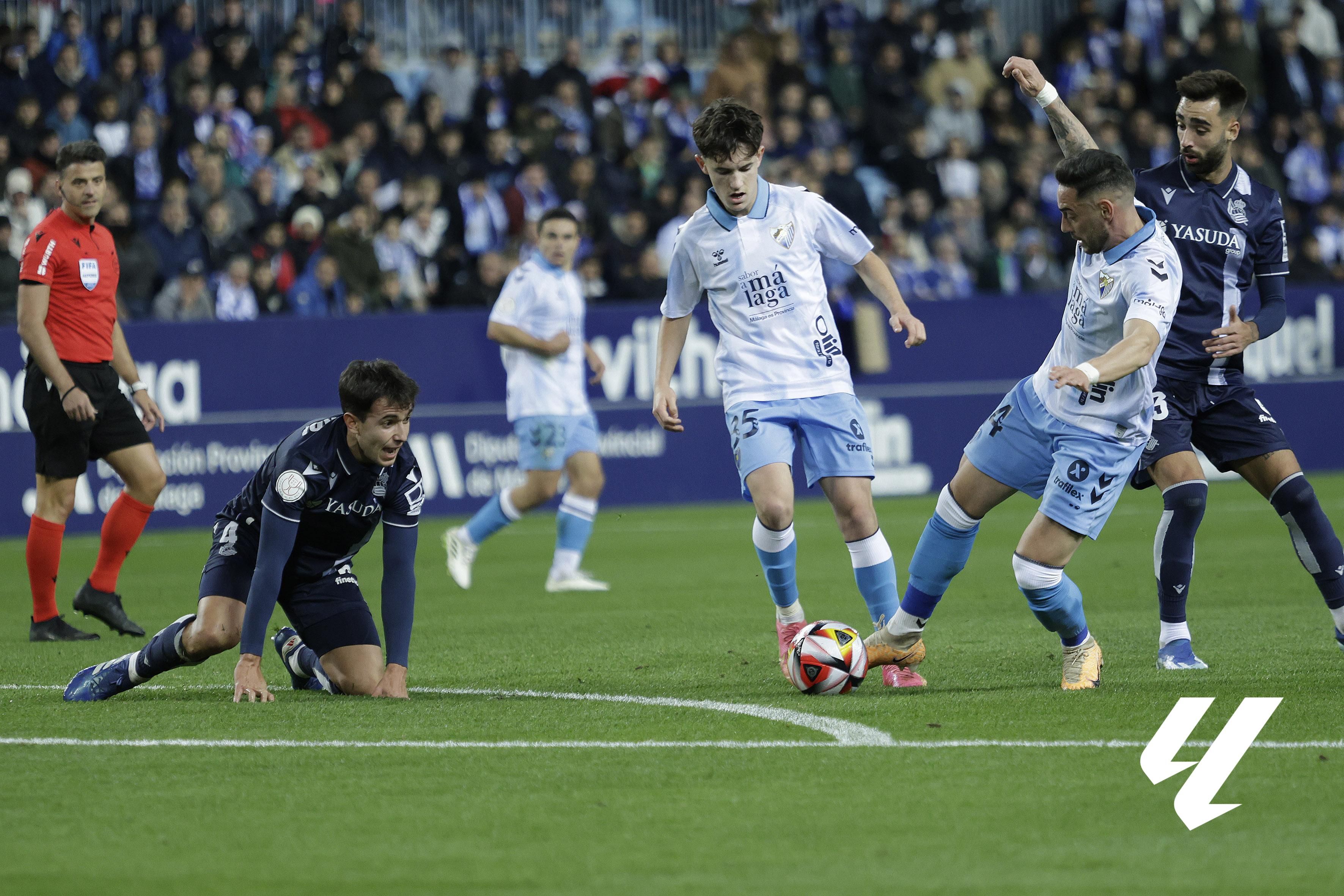  Aarón Ochoa junto a Víctor García en el Málaga - Real Sociedad de Copa.