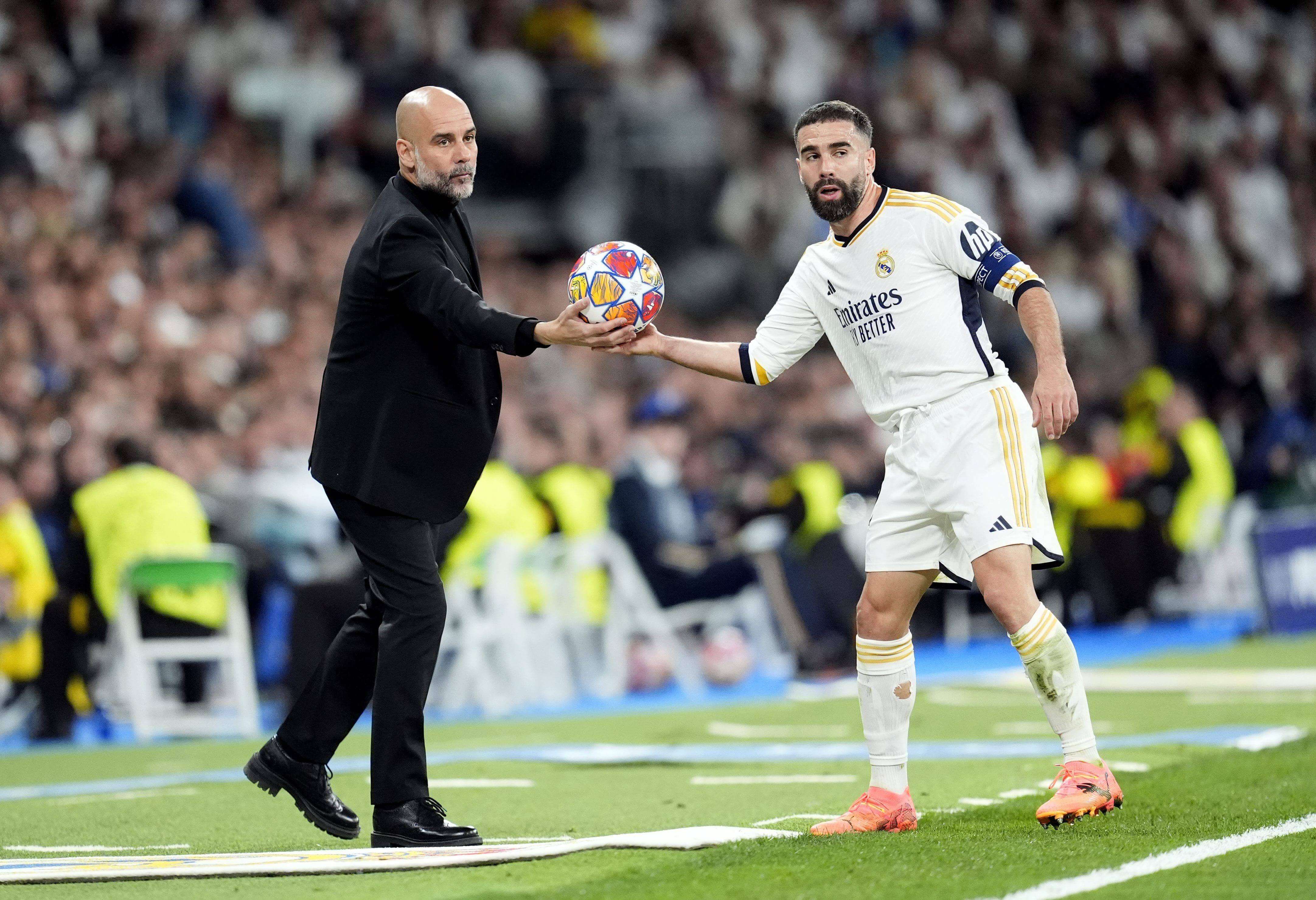  Pep Guardiola y Dani Carvajal, en el Real Madrid-Manchester City.