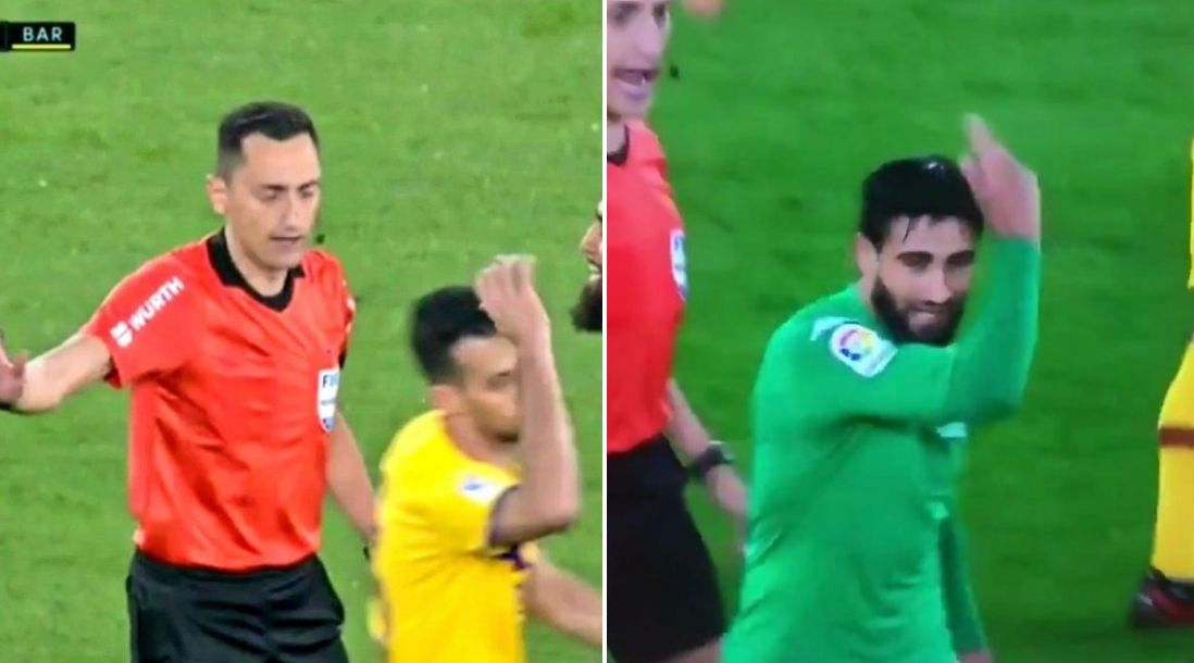  Busquets y Fekir se quejan a Sánchez Martínez.