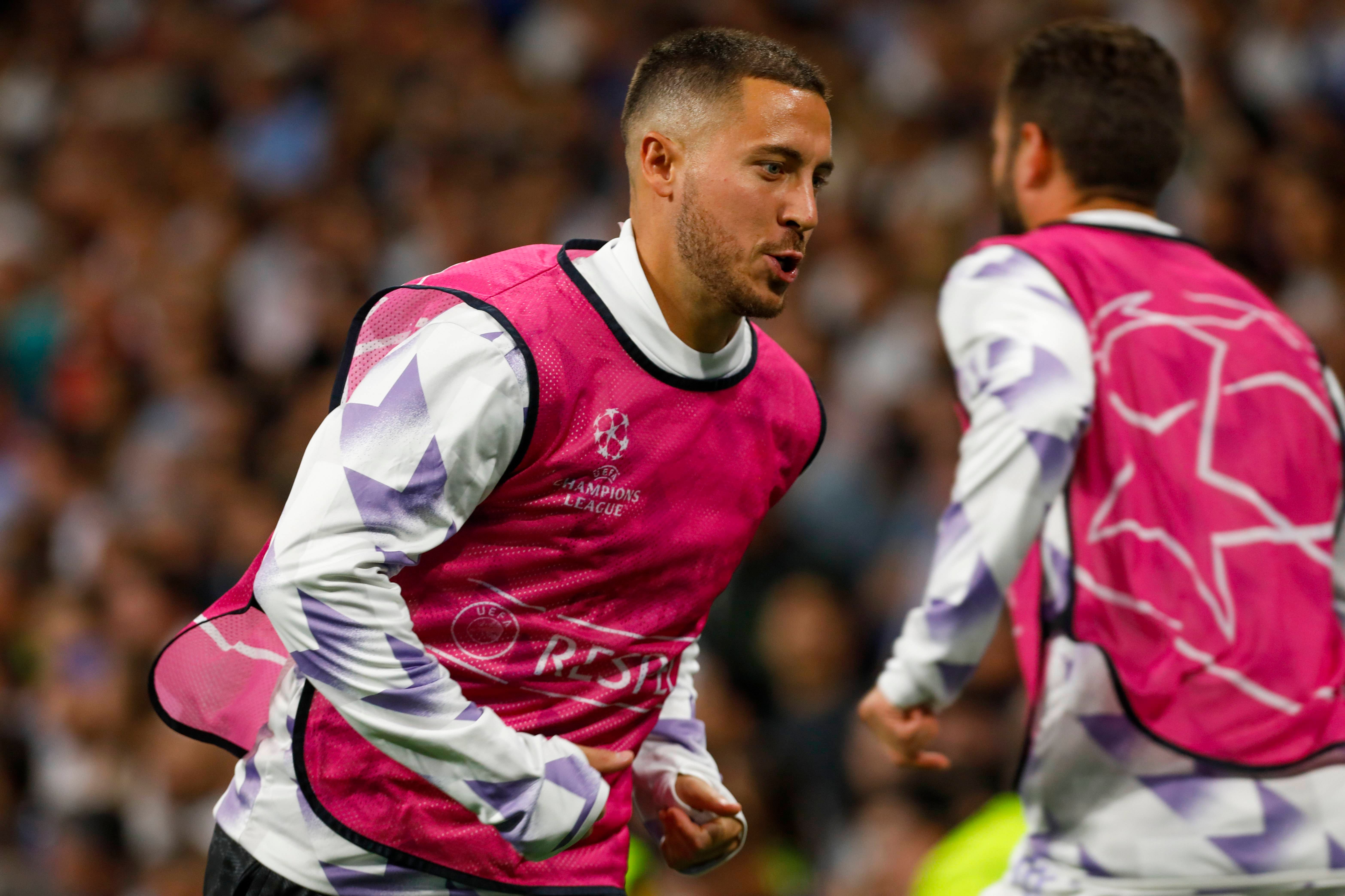  Eden Hazard, durante un calentamiento de Champions con el Real Madrid.