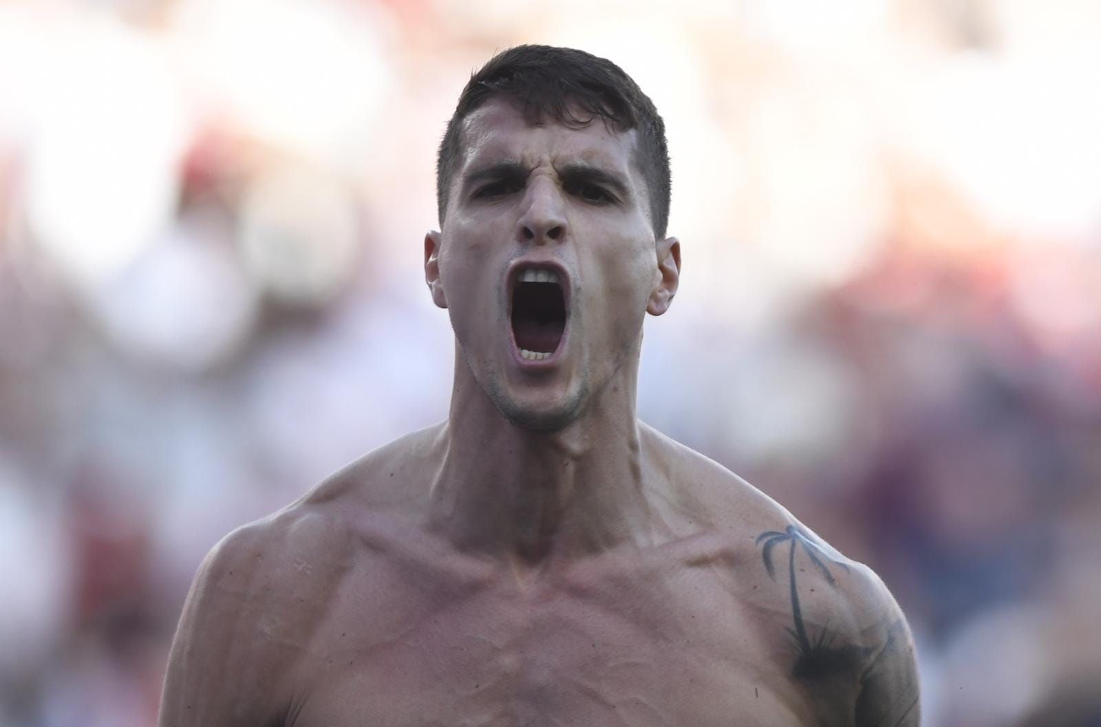 Erik Lamela celebra su gol al Almería