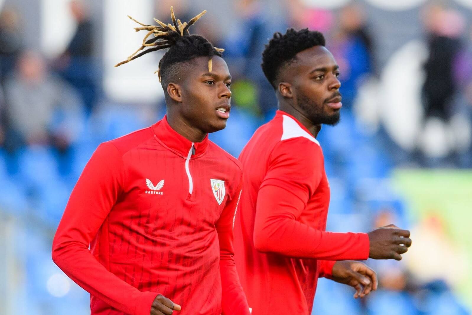 Los hermanos Williams, Nico e Iñaki, calientan para jugar este viernes ante el Getafe CF en el Coliseum.