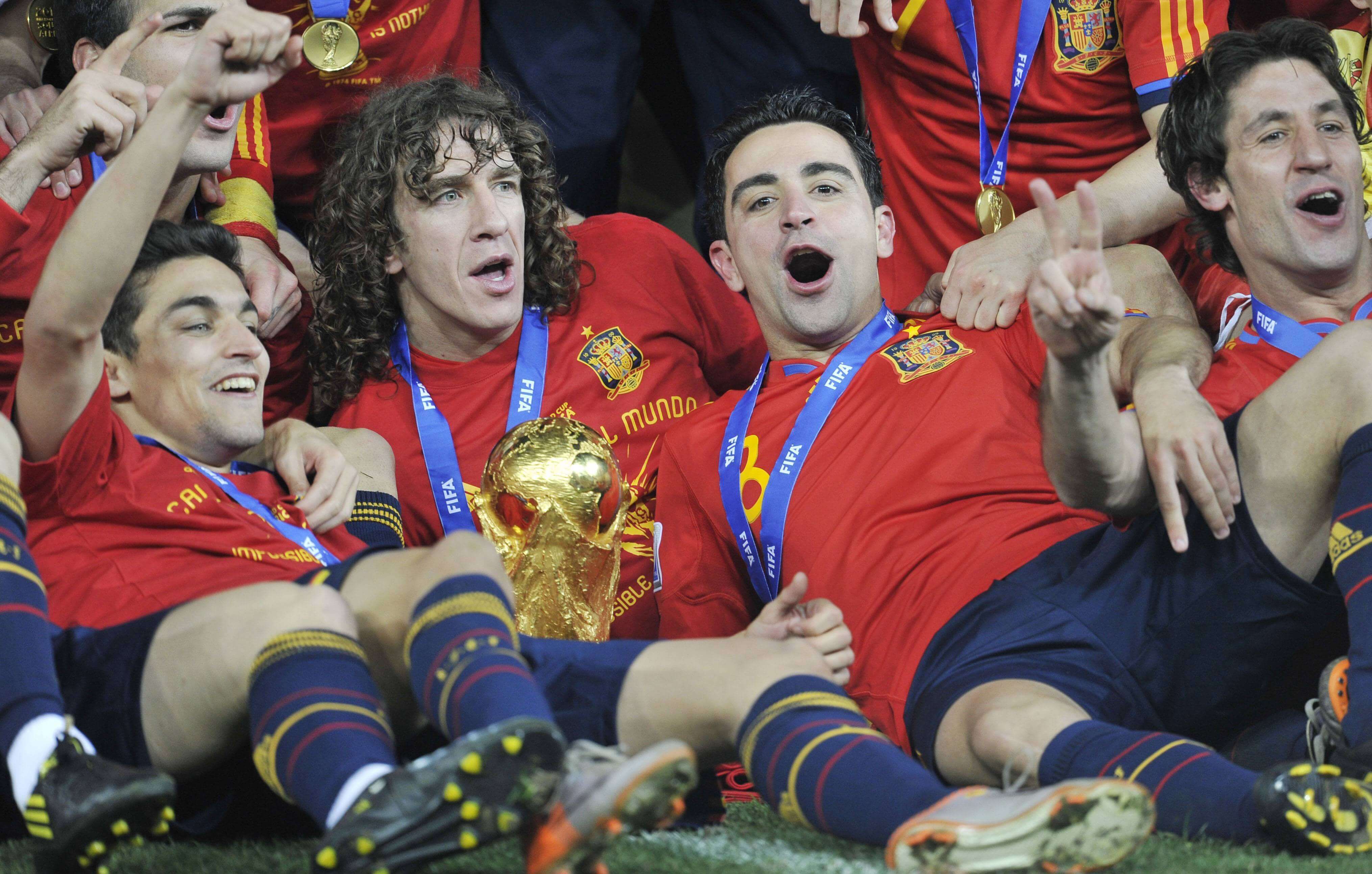  Jesús Navas, celebrando el Mundial junto a Puyol y Xavi Hernández.
