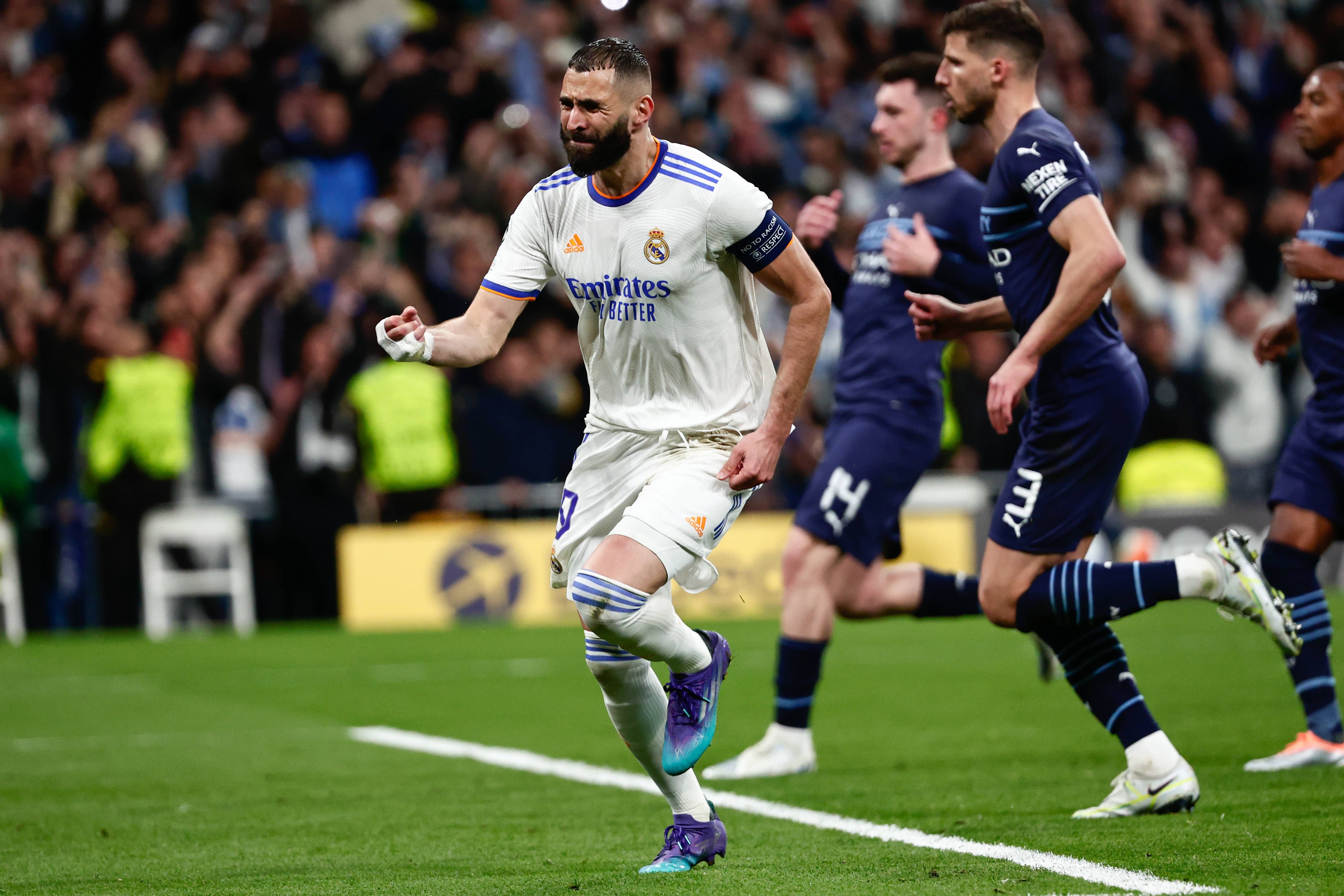 Karim Benzema celebra el 3-1 del Real Madrid al City.