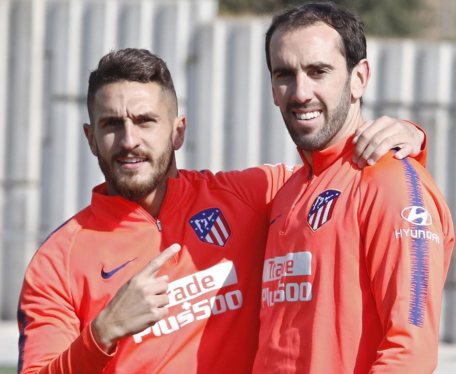 Koke y Godín, en una sesión con el Atlético.