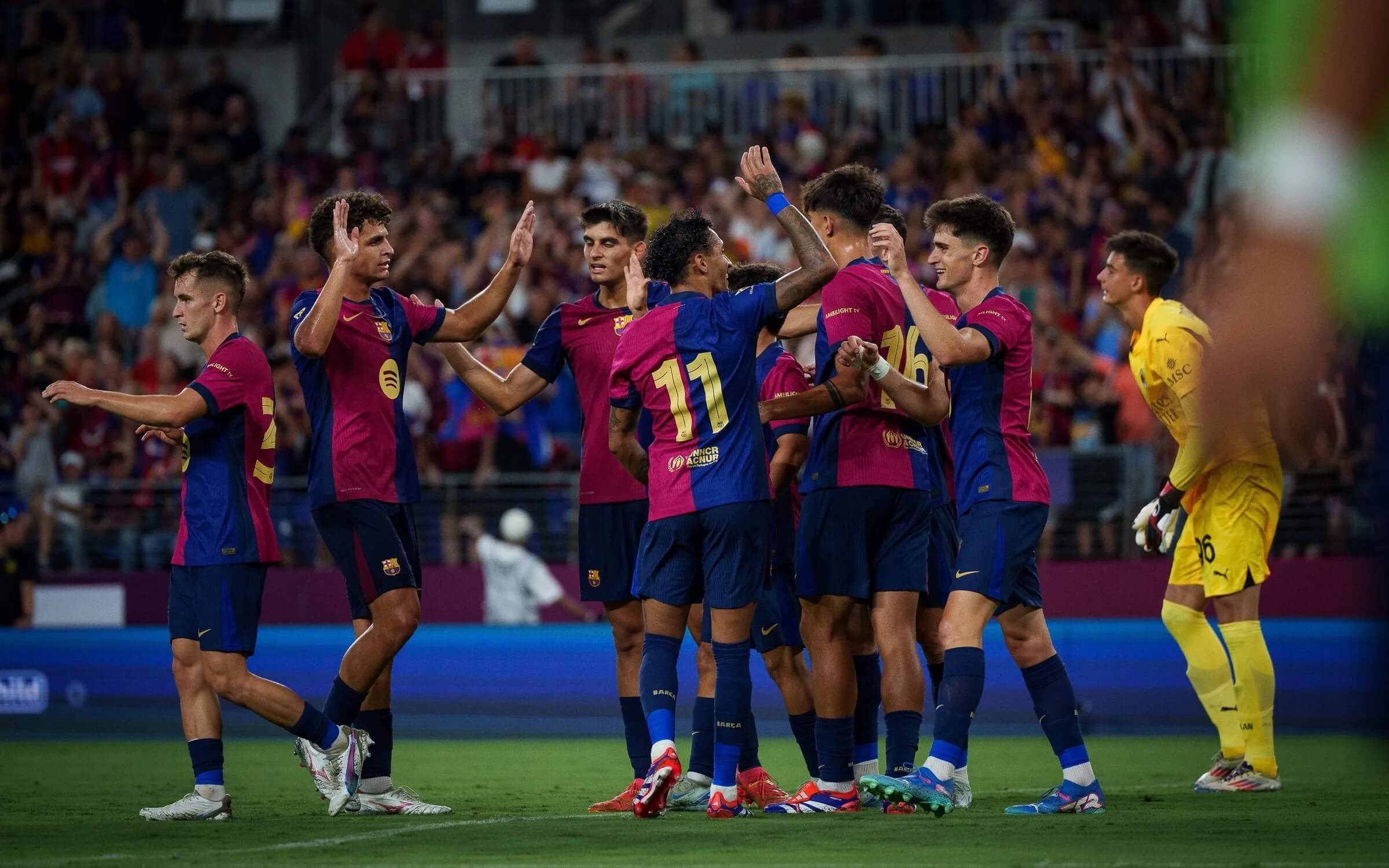 Los jugadores del Barcelona celebran un gol en pretemporada.