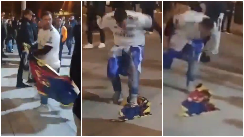  Aficionado del Real Madrid con una bandera del Barça