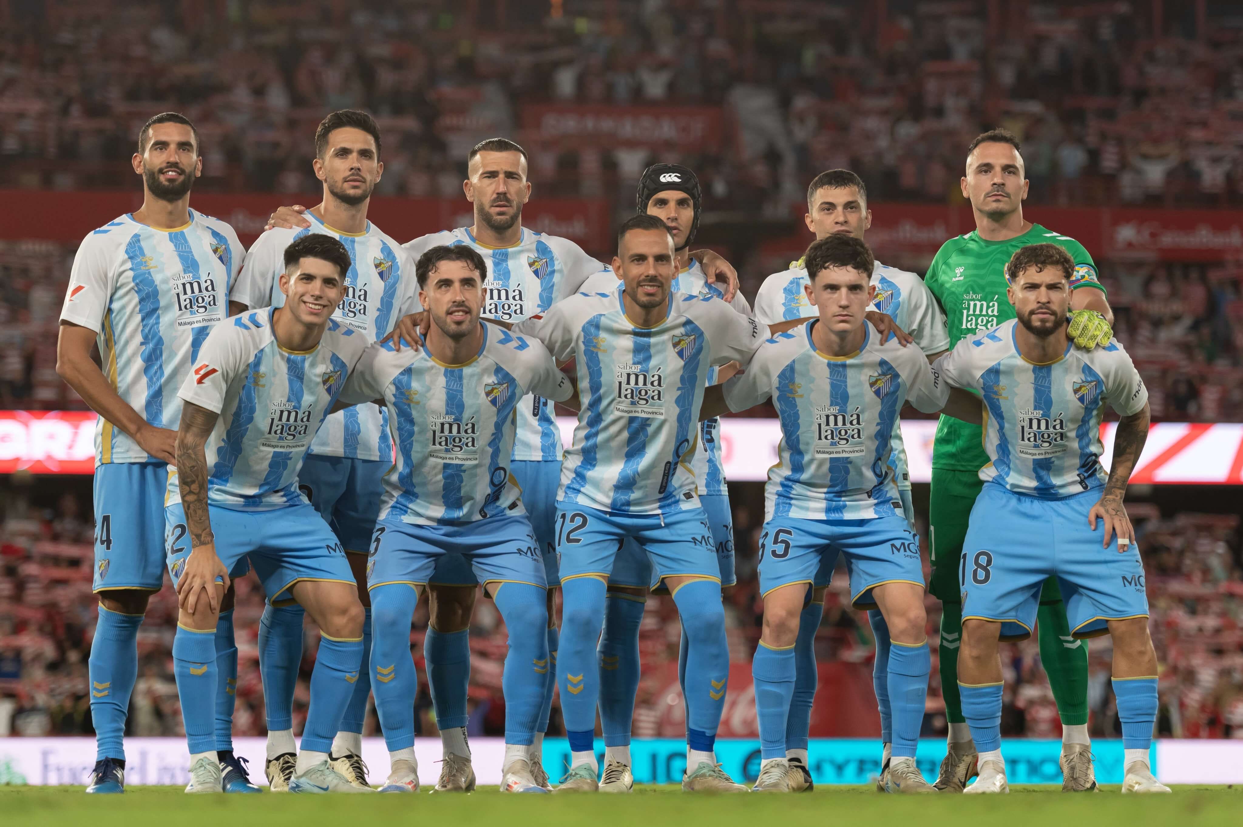 Once del Málaga en Los Cármenes ante el Granada en la primera vuelta.