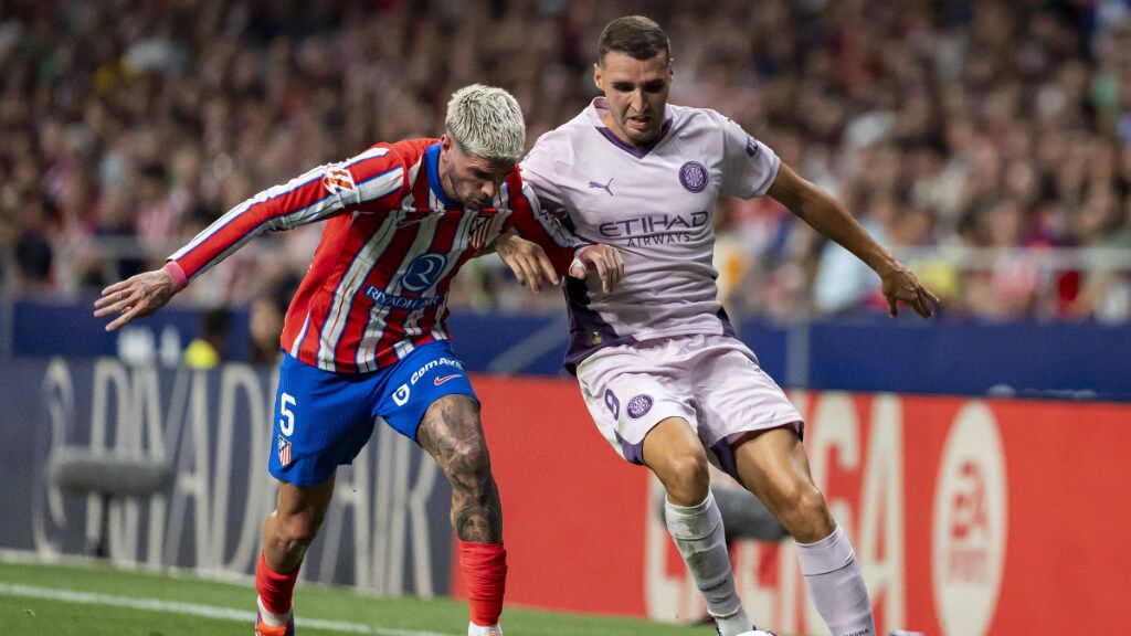 Abel Ruiz contra Rodrigo de Paul en el Atlético de Madrid - Girona (Cordon Press)